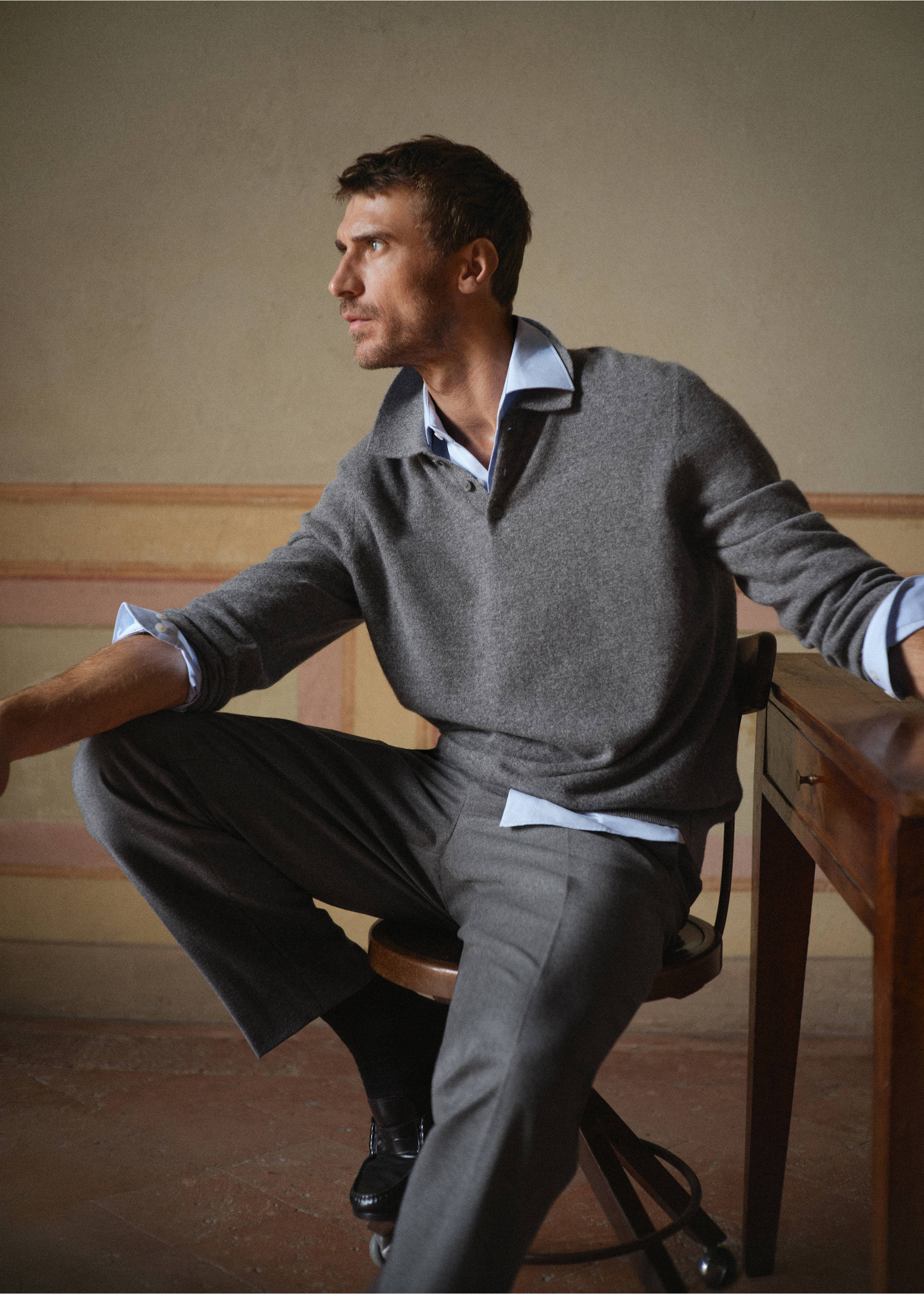 Grey knit polo shirt layered over a light blue shirt., Medium Heather Grey. Ref: 37088274-00.