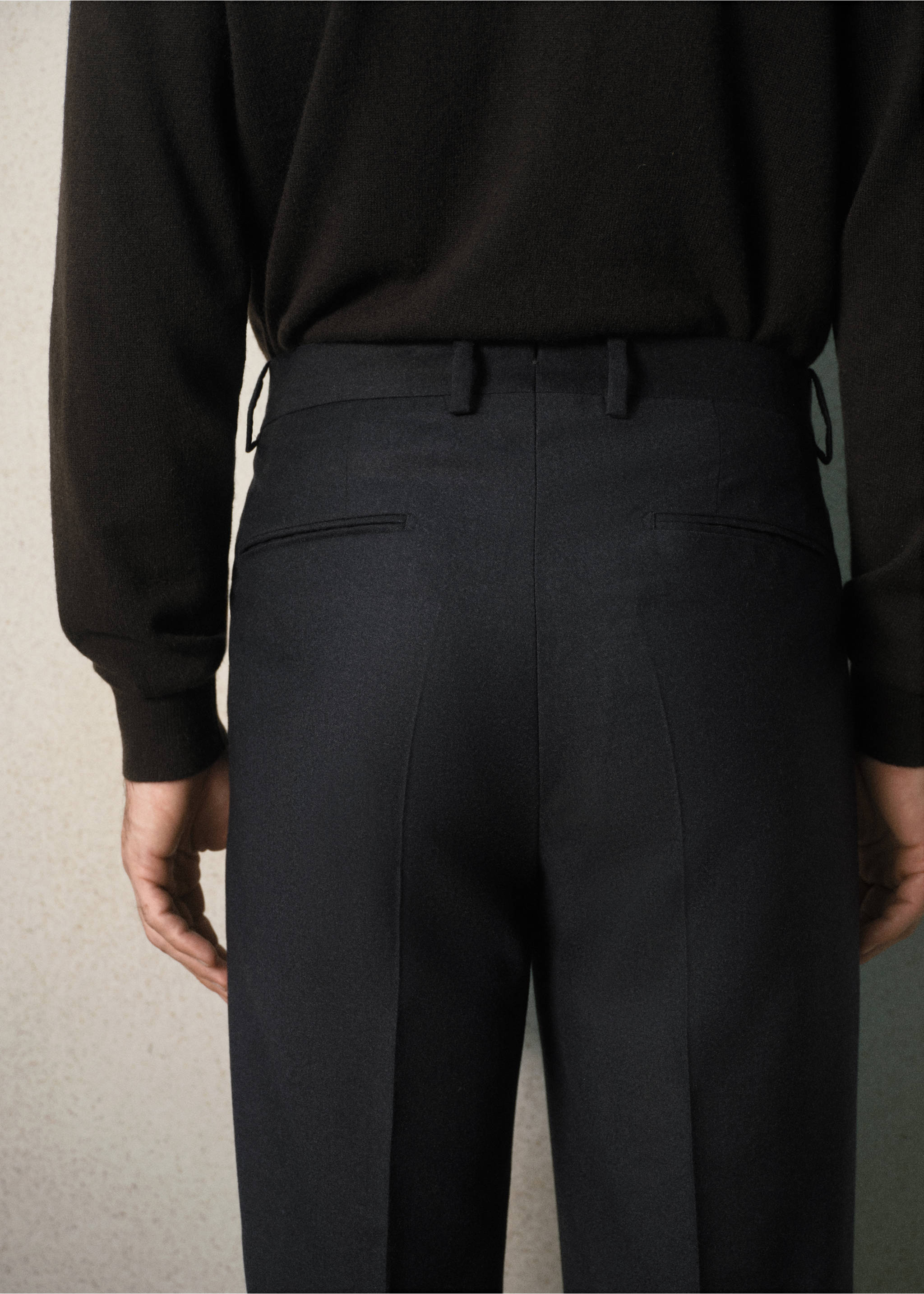 Dark tailored trousers with back welt pockets, seen from behind., Charcoal. Ref: 37088283-00.