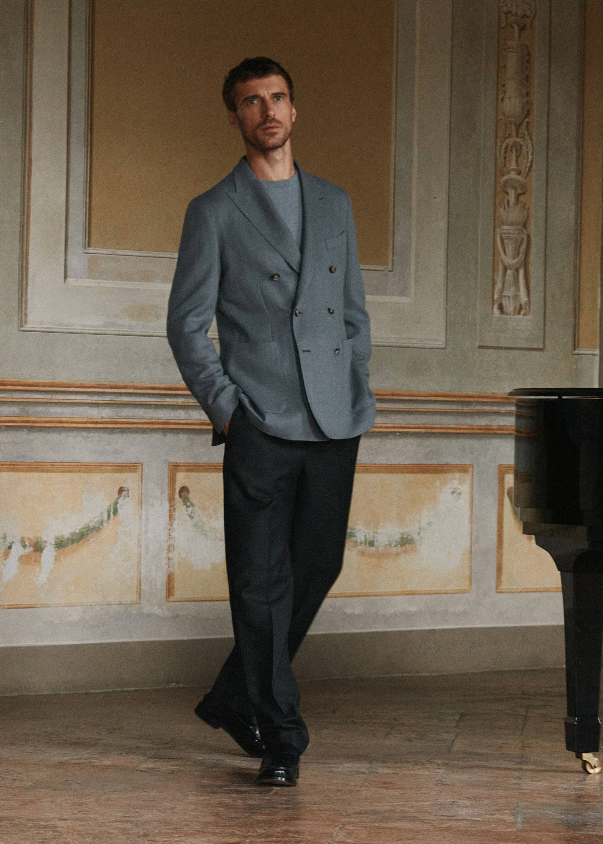 Dark grey trousers worn with a grey double-breasted blazer, Charcoal. Ref: 37088283-00.