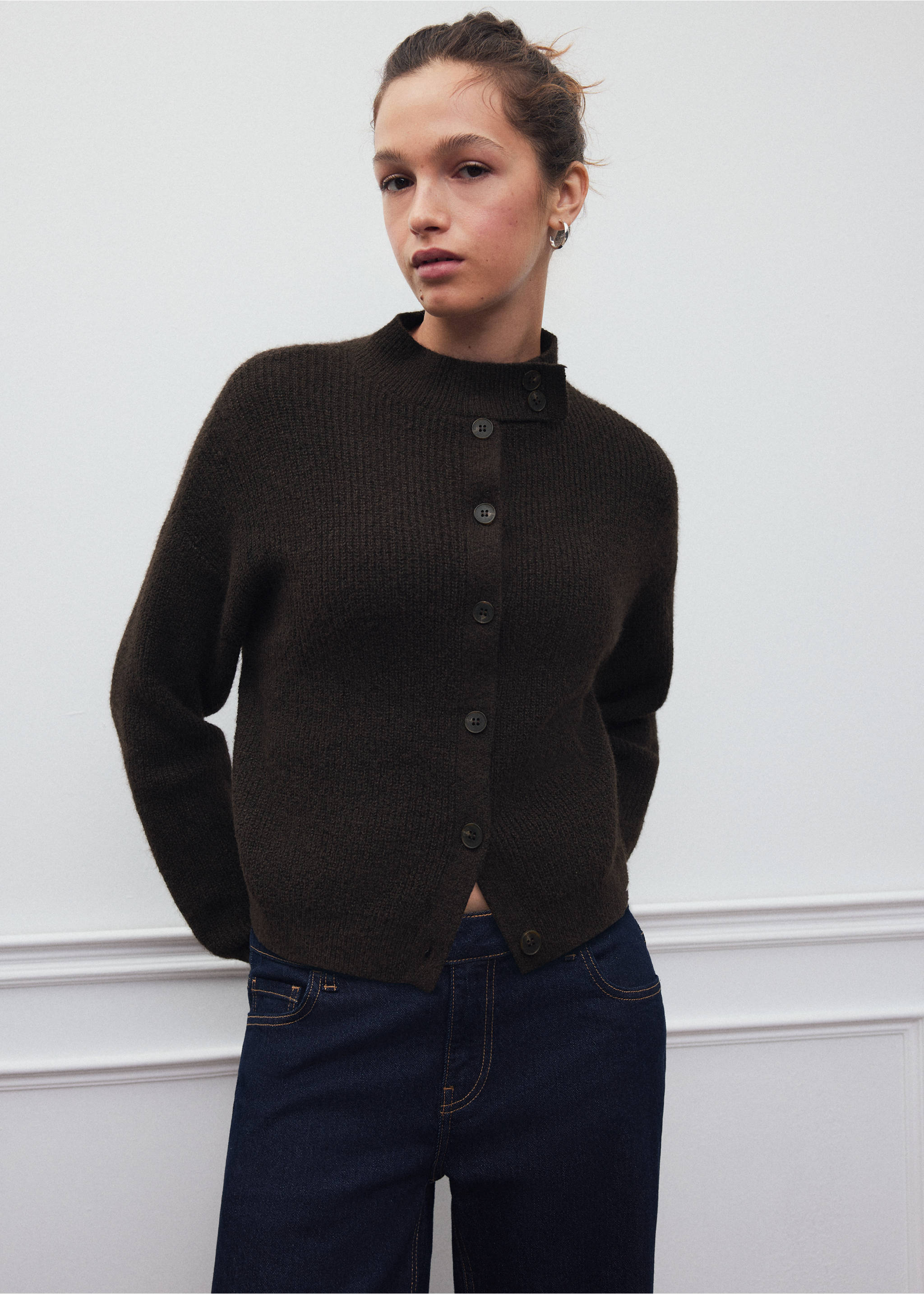 Dark brown ribbed knit cardigan with high buttoned collar and dark denim trousers., Brown. Ref: 37088285-00.