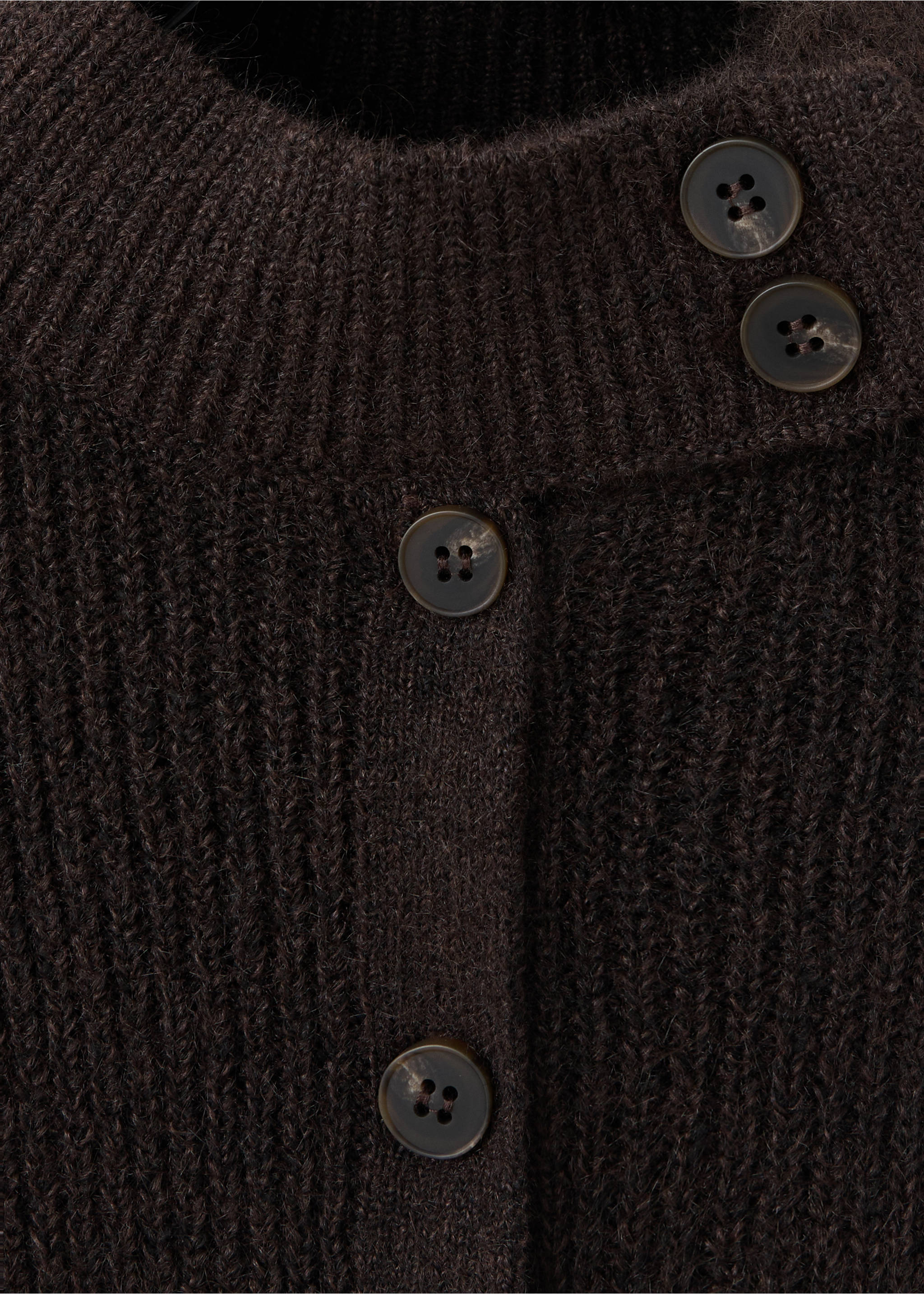 Close-up of a dark brown ribbed knit cardigan with button details., Brown. Ref: 37088285-00.