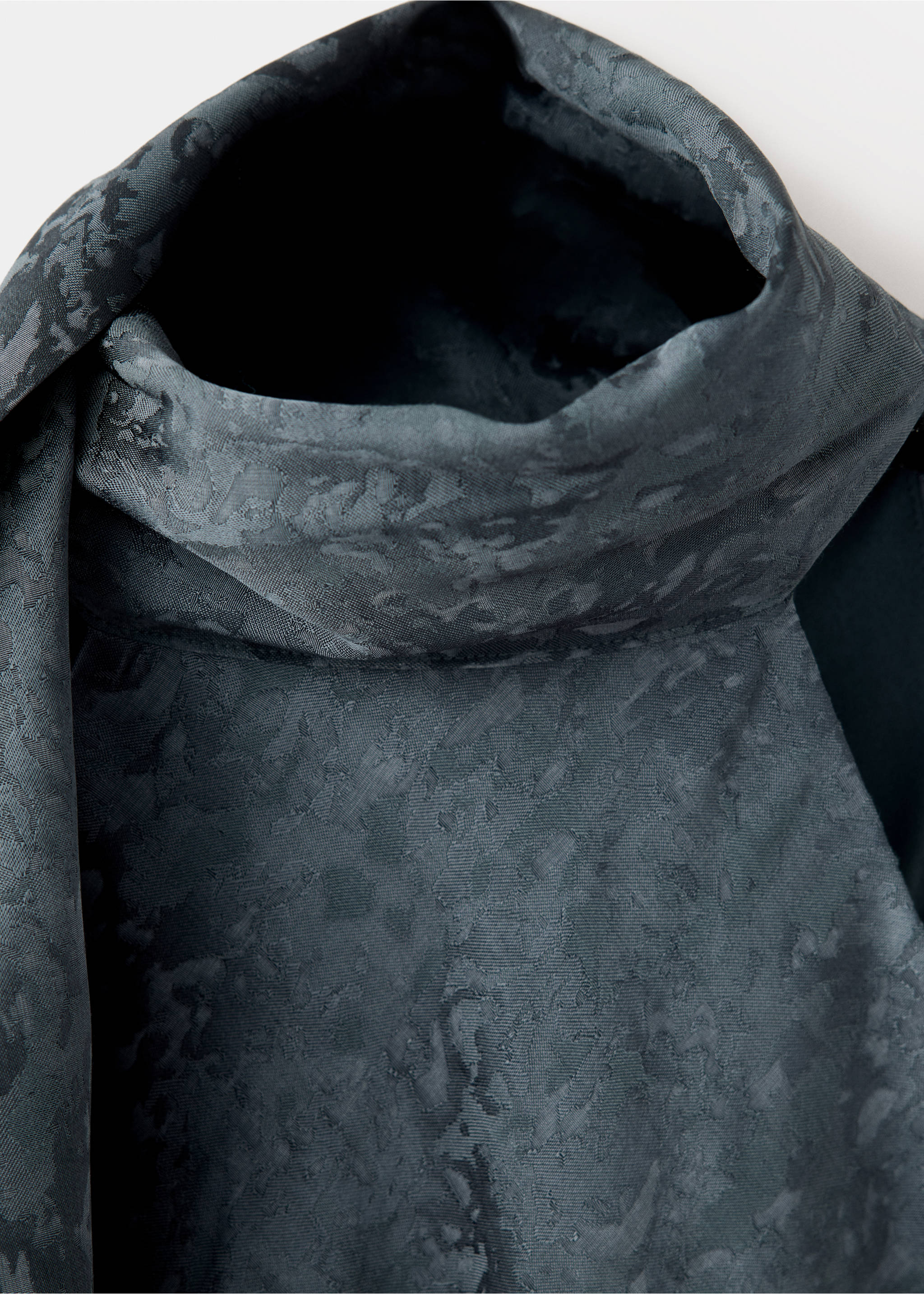Dark grey patterned dress detail focusing on the high neckline., Grey. Ref: 37089116-00.
