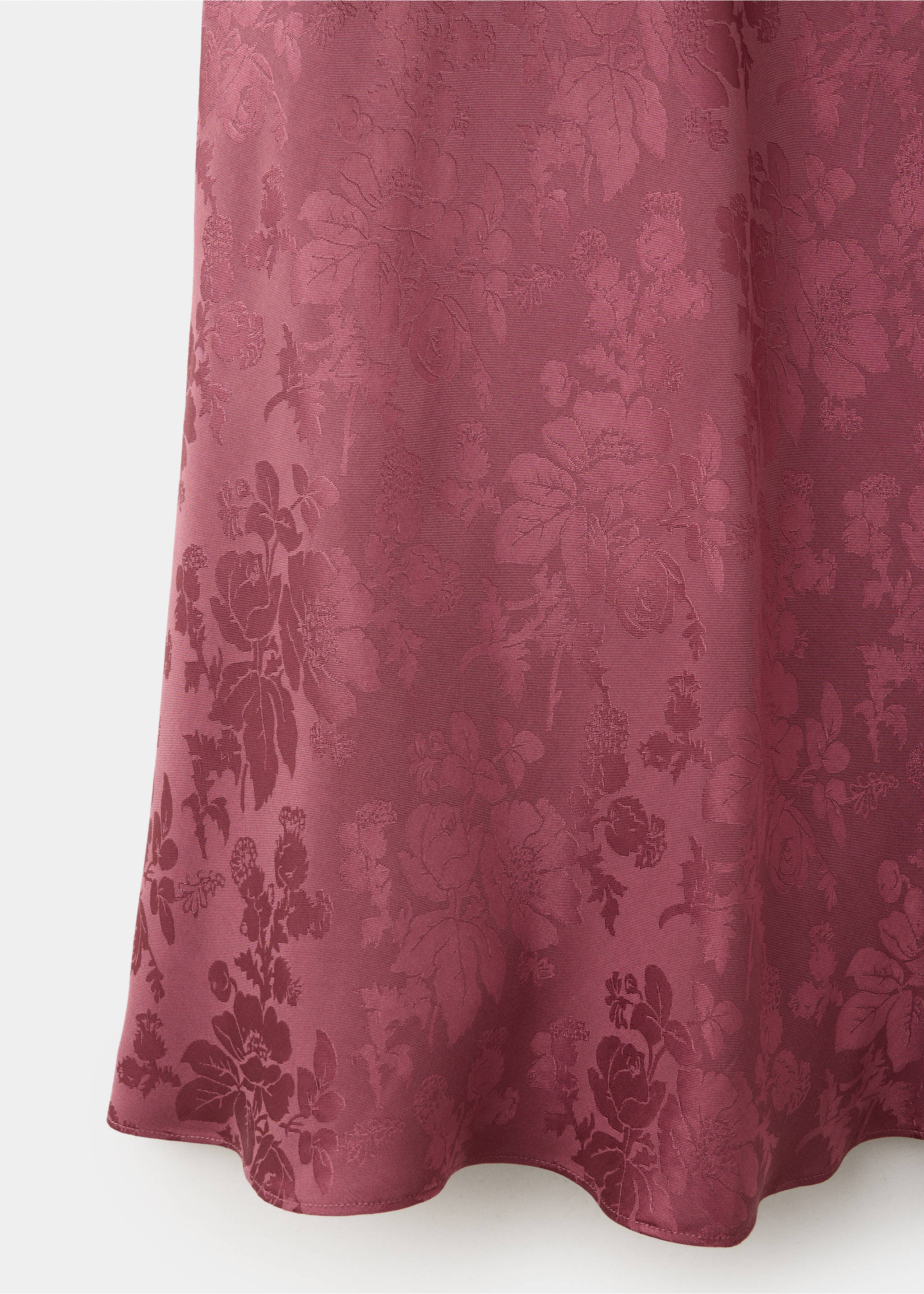 Close-up of a burgundy skirt fabric with a tonal floral jacquard pattern., Pink. Ref: 37089119-00.