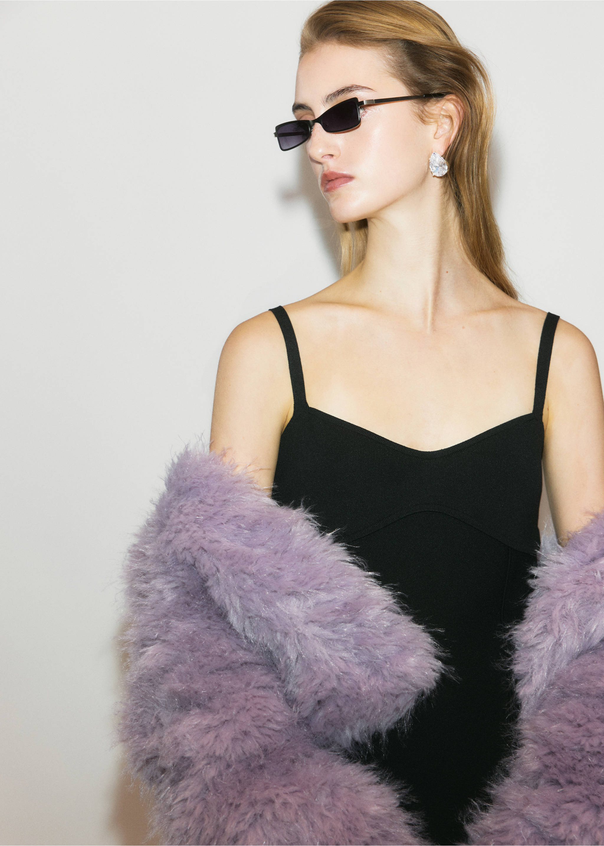 Black rectangular sunglasses worn by a model in a black top and lilac faux-fur coat., Silver. Ref: 37089137-00.