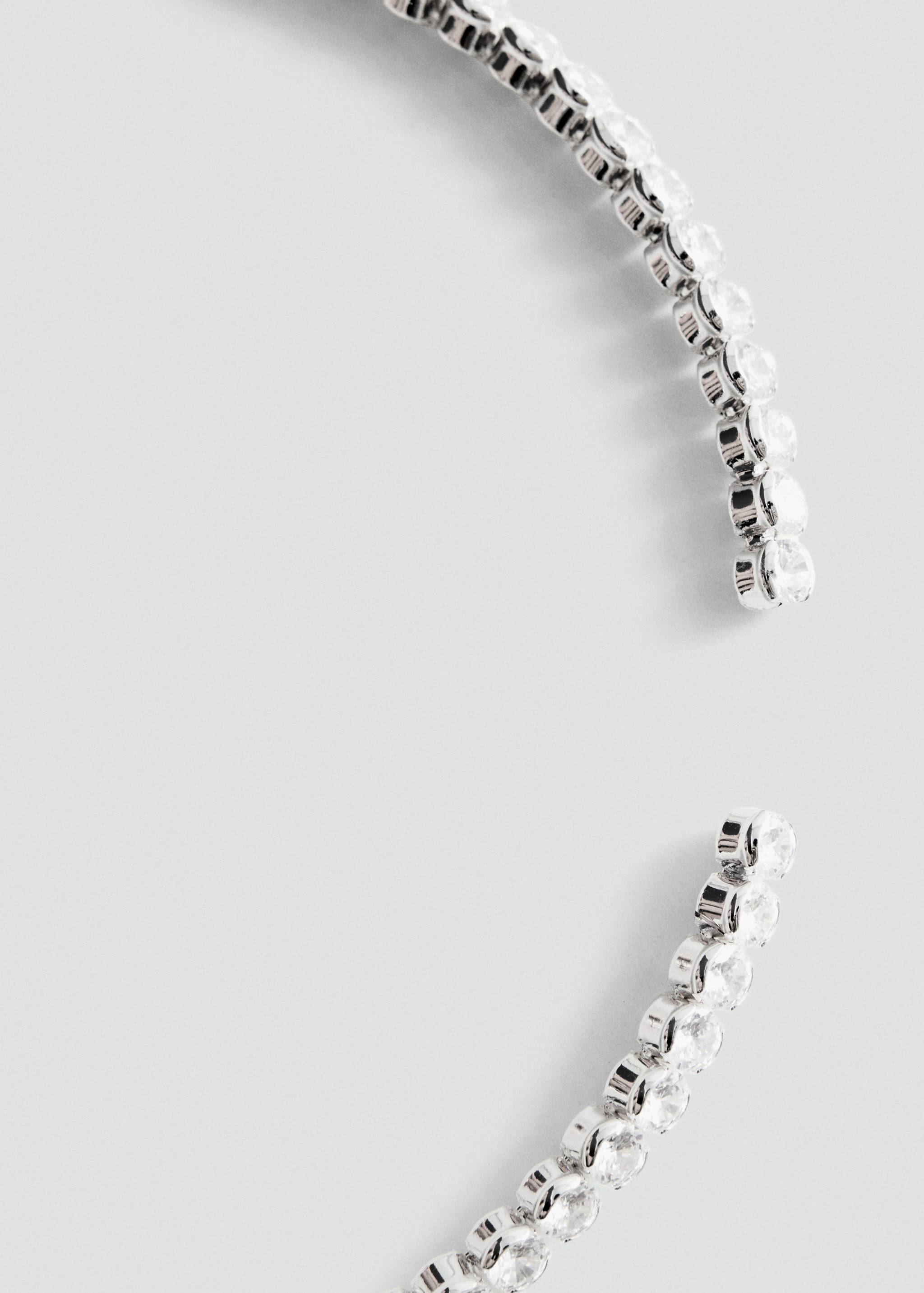 Close-up of a rhinestone collar necklace.