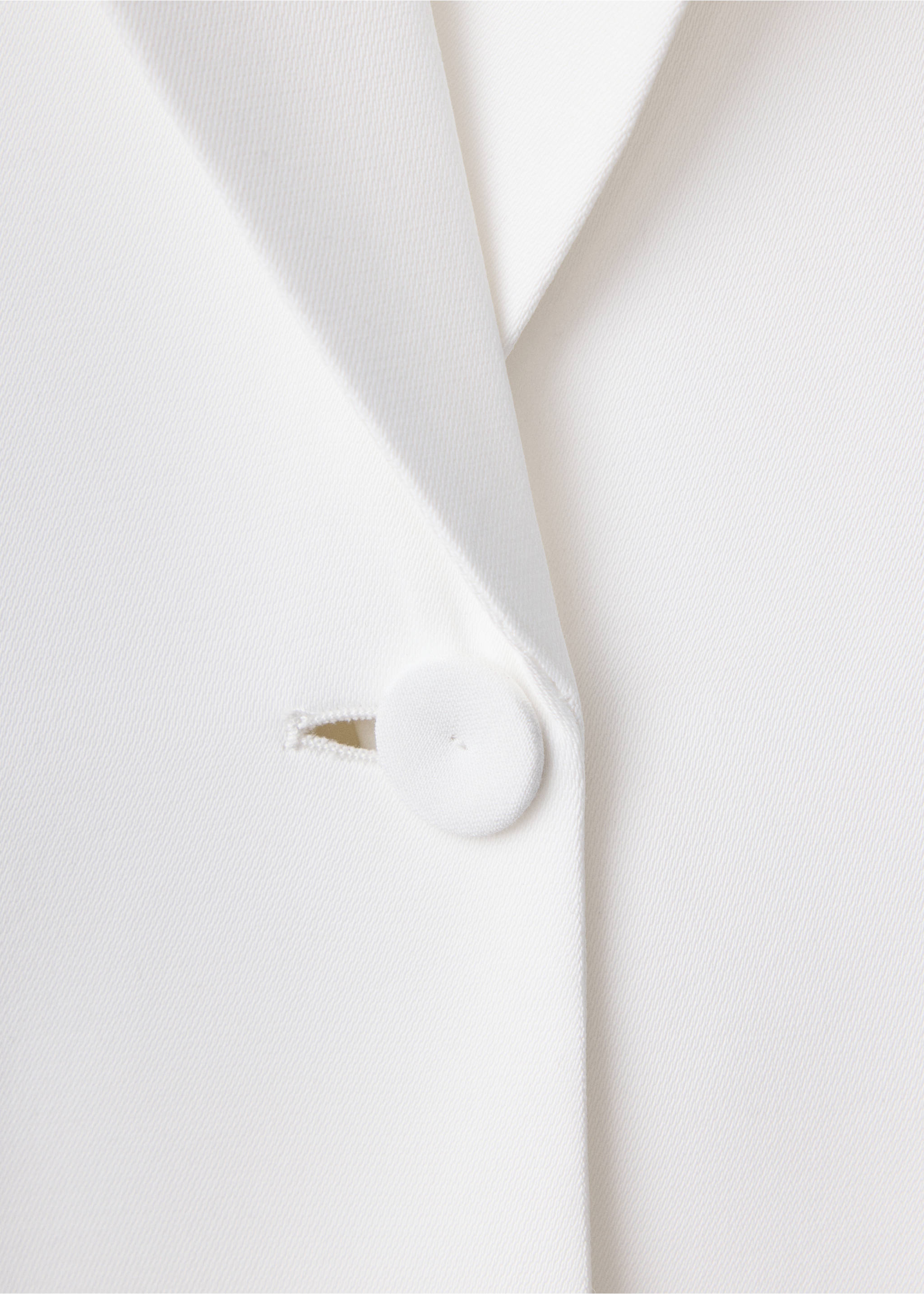 Close-up of white dress fabric and button detail., White. Ref: 37089142-00.