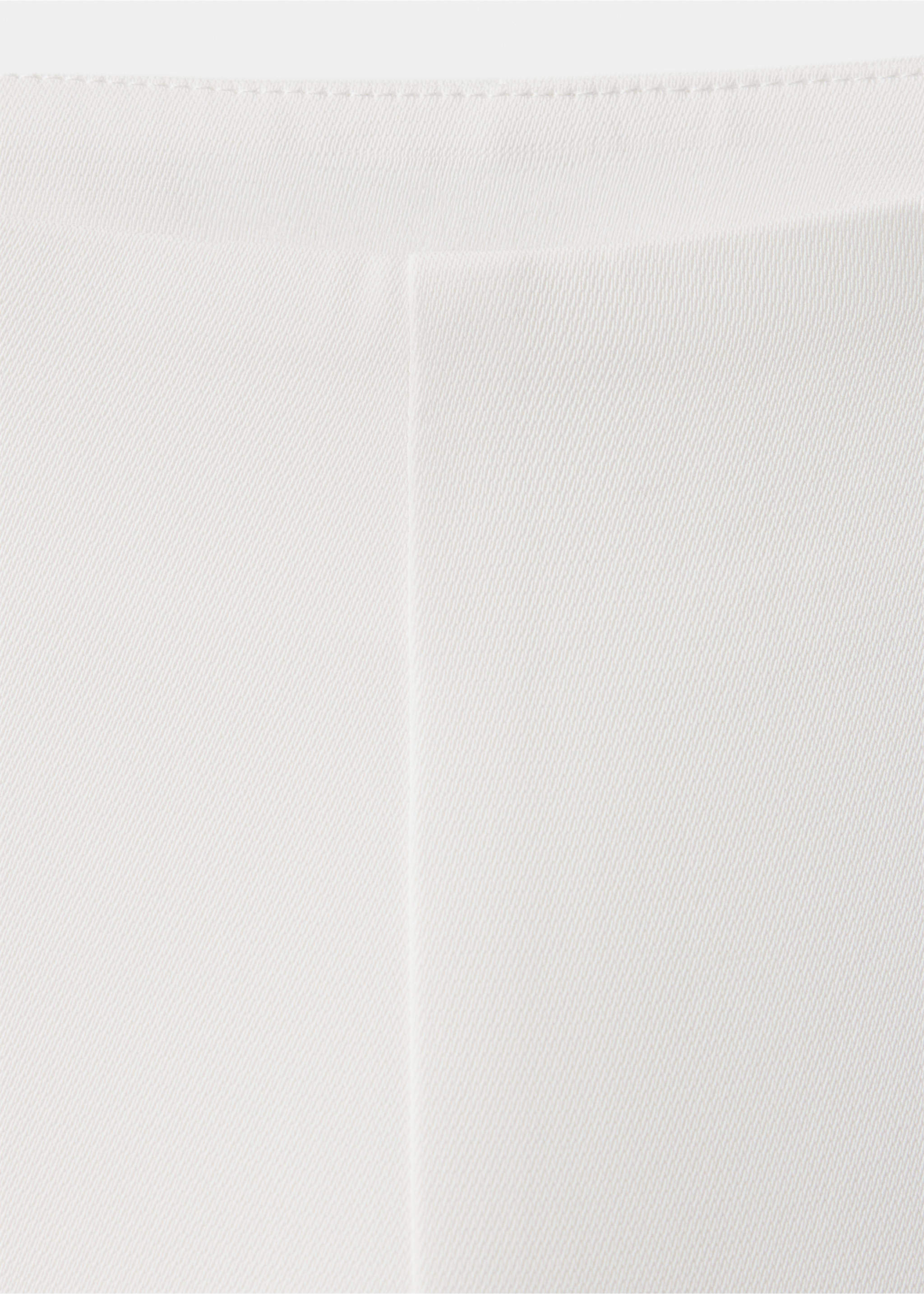 Close-up of white trousers showcasing the waistband and front pleat., Ecru. Ref: 37089143-00.
