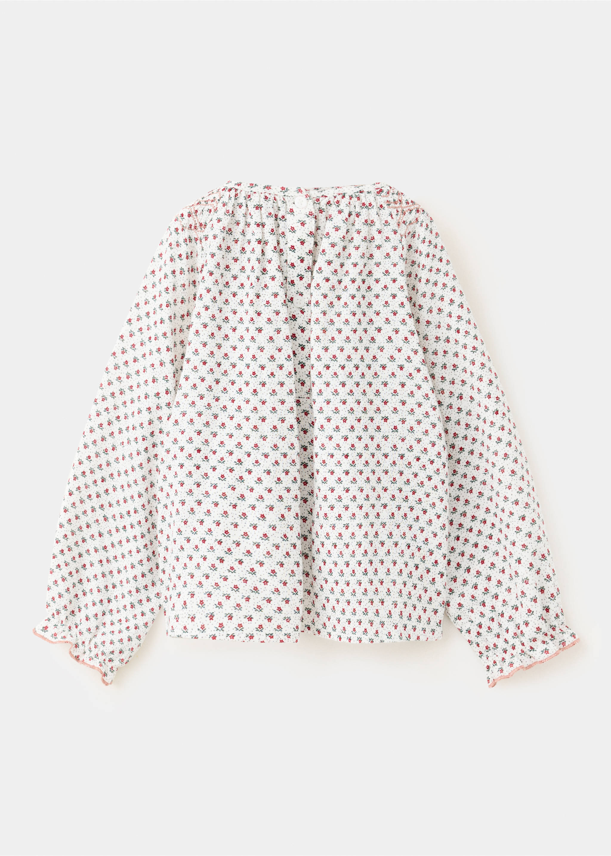 Kids' floral print blouse in white with long ruffled cuffs and smocked back., Off White. Ref: 37089217-00.