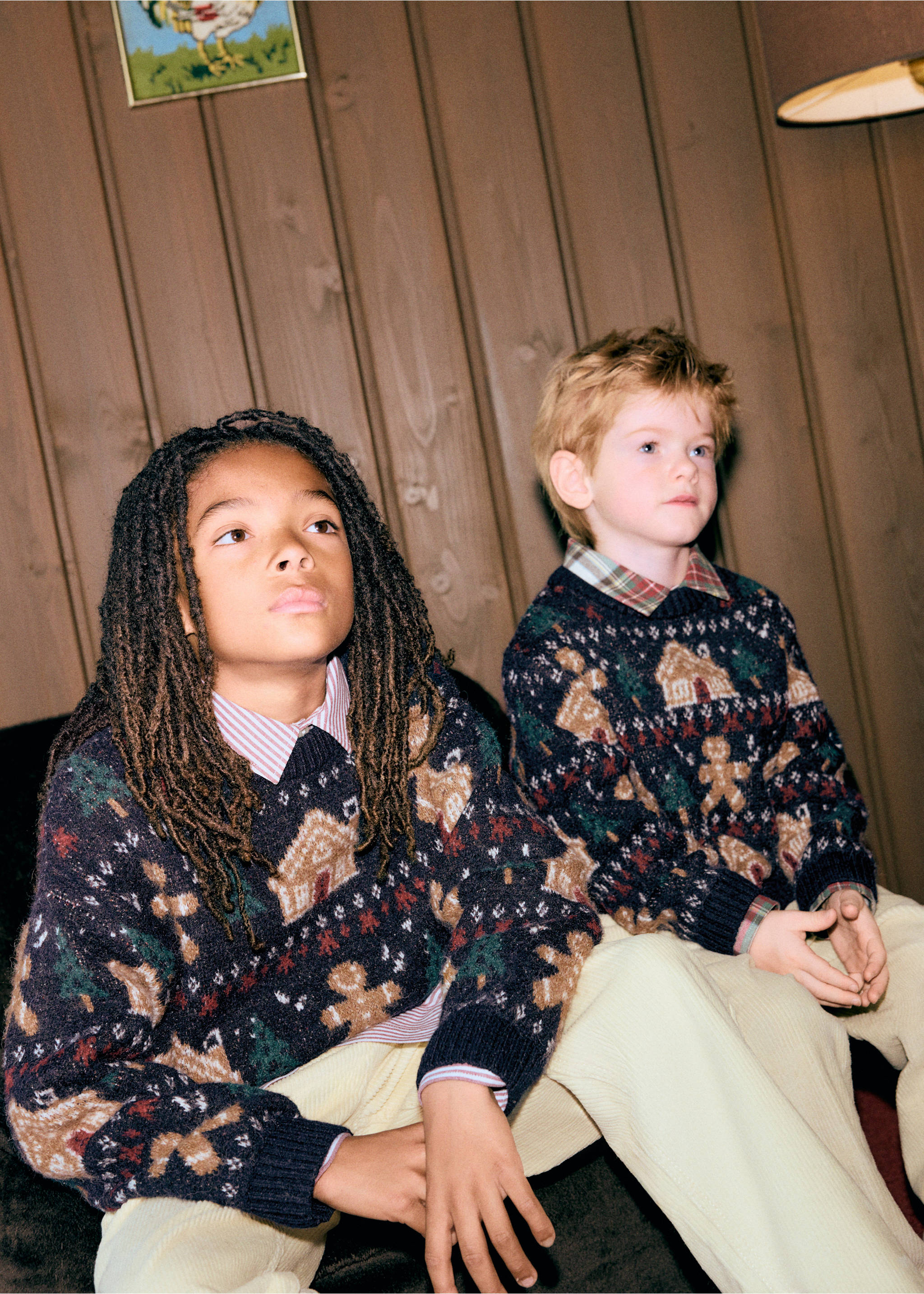 Navy blue intarsia knit gingerbread jersey worn by two children., Navy. Ref: 37089224-00.