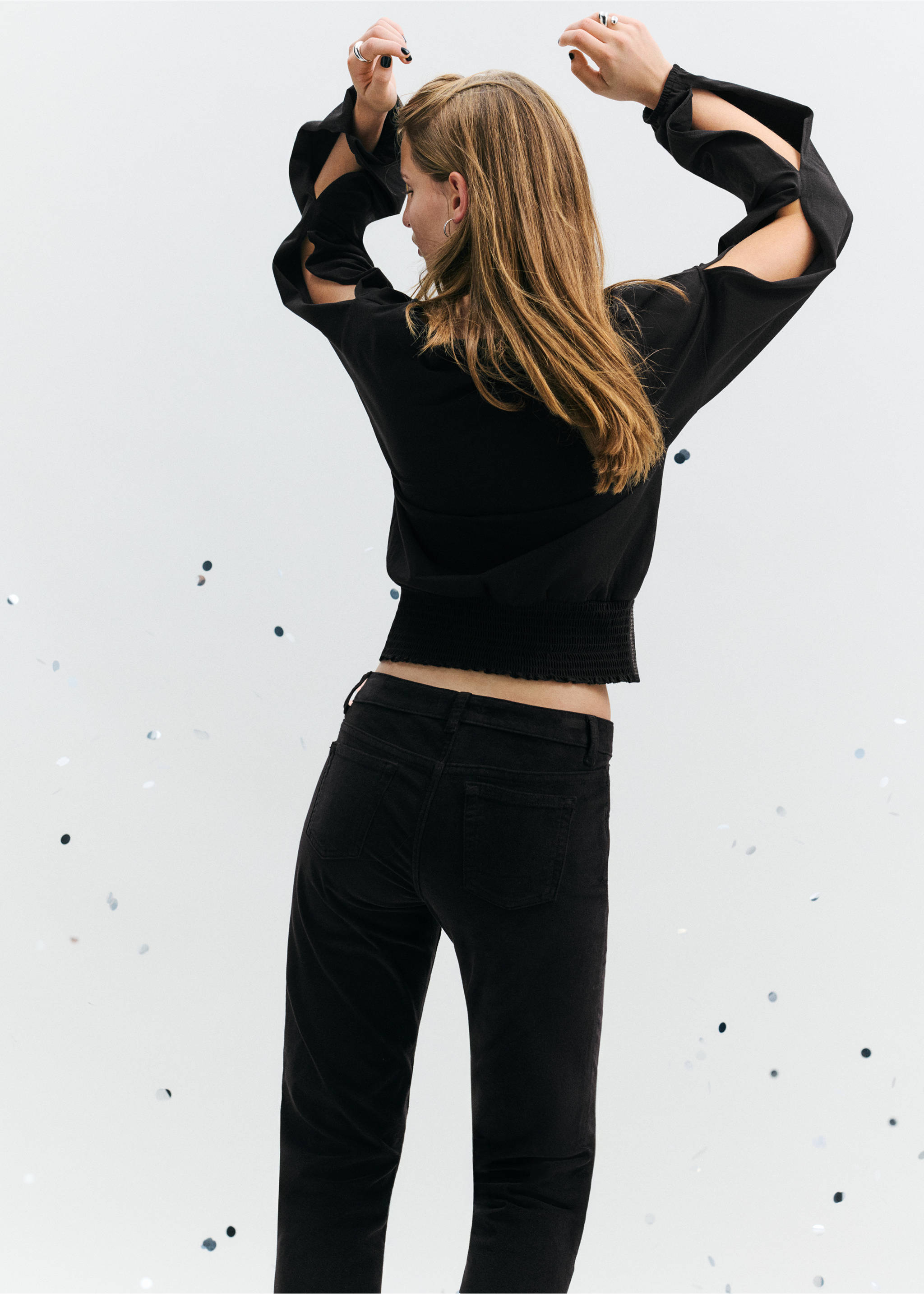 Black long-sleeved t-shirt with cut-outs and smocked hem, back view., Black. Ref: 37089227-00.