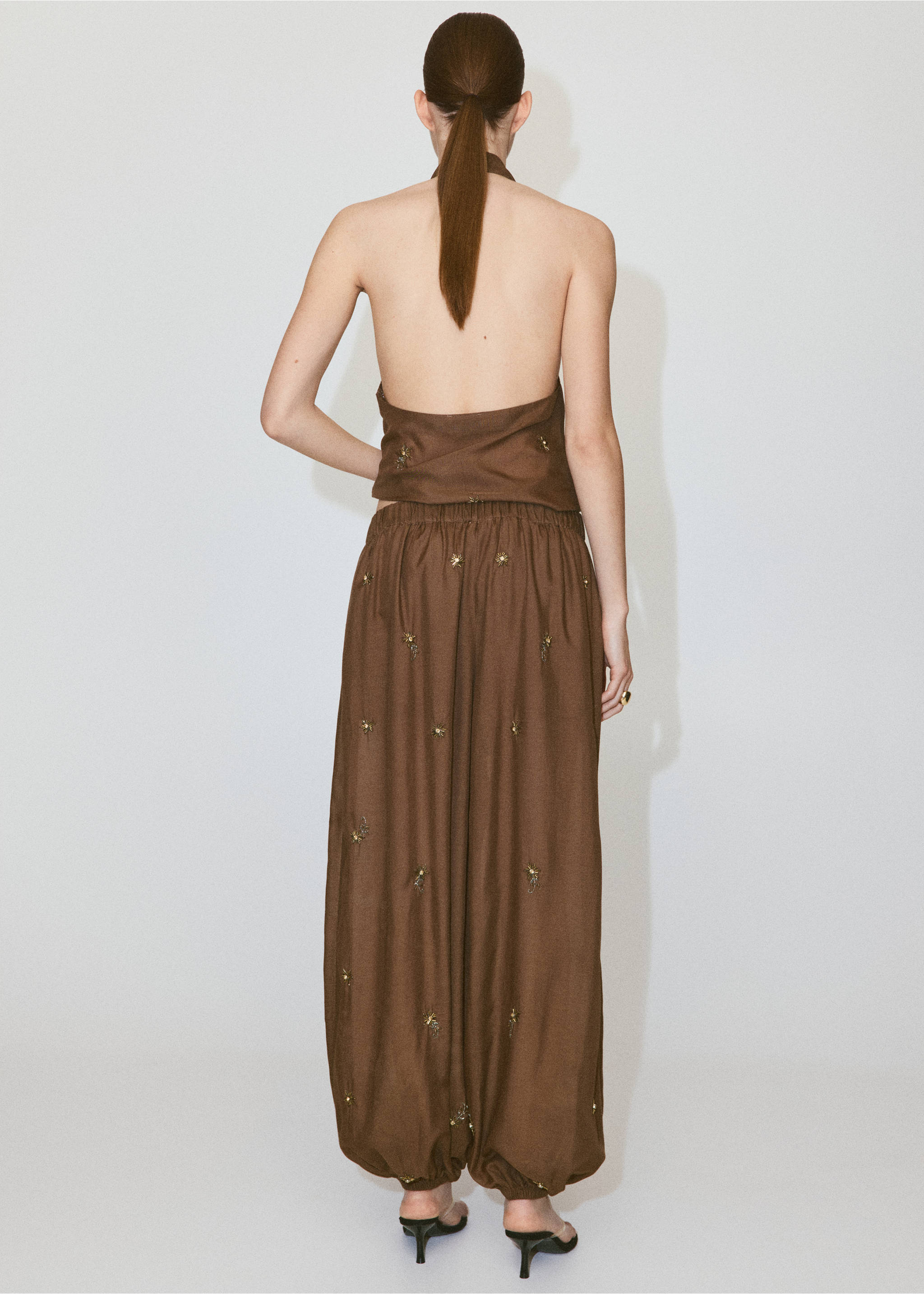 Balloon trousers with embroidered appliqués - Reverse of the article, Brown. Ref: 37091369-00.
