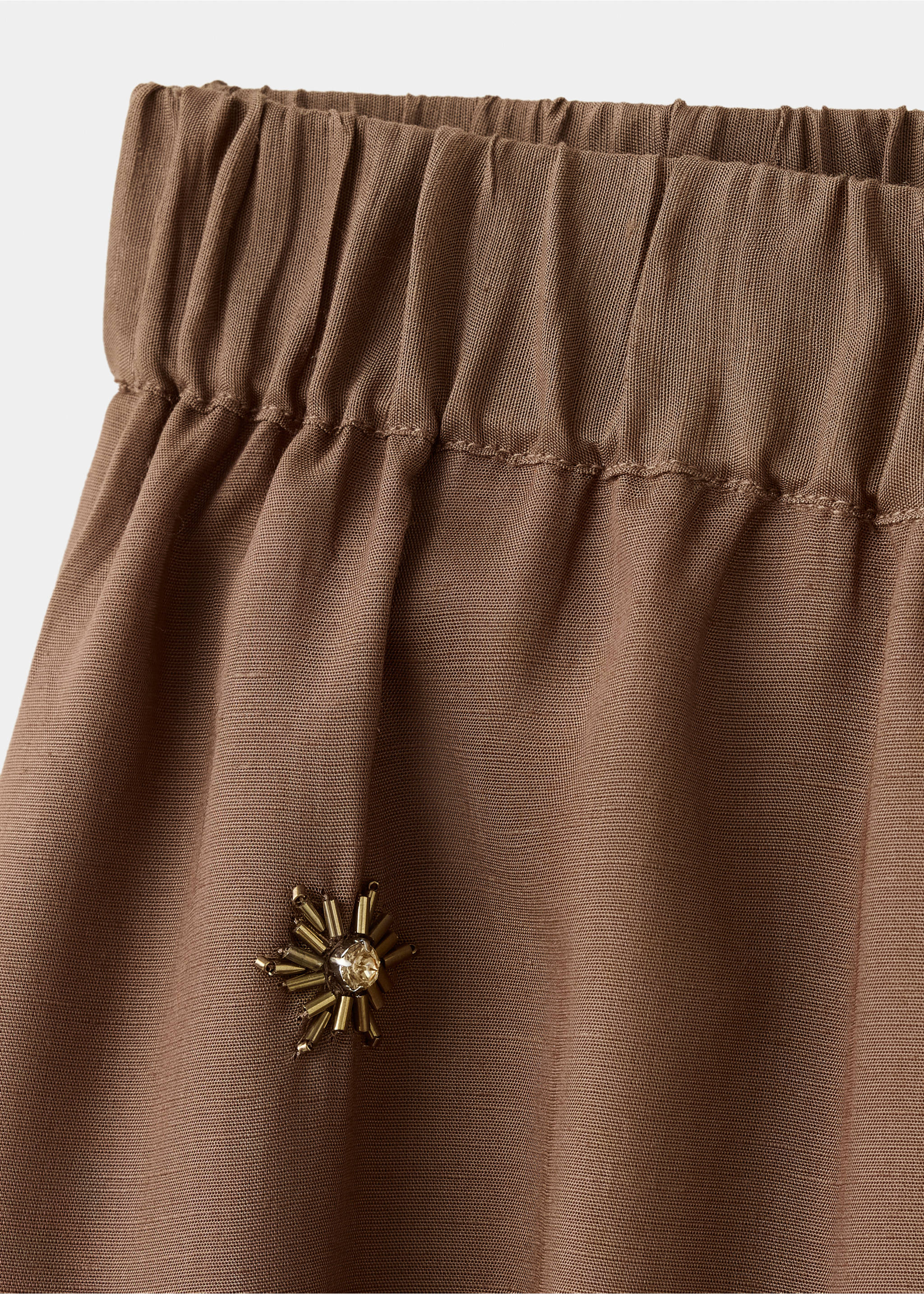 Balloon trousers with embroidered appliqués - Details of the article 0, Brown. Ref: 37091369-00.