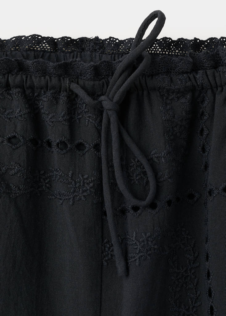 Cotton trousers with eyelet embroidery