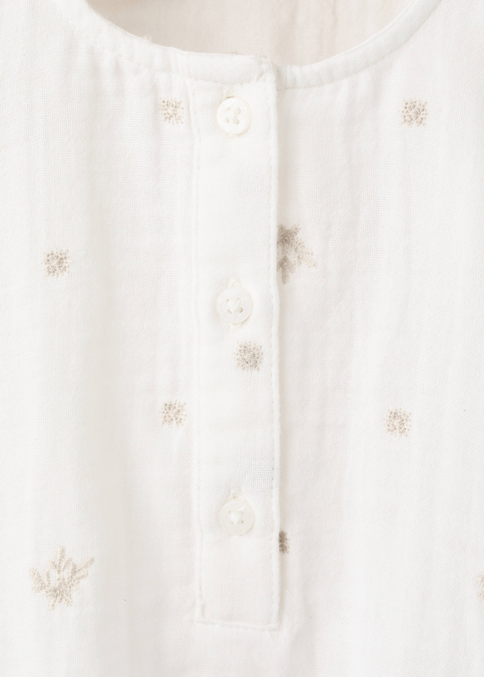 Strampler mit Stickereidetails - Detail des Artikels 0