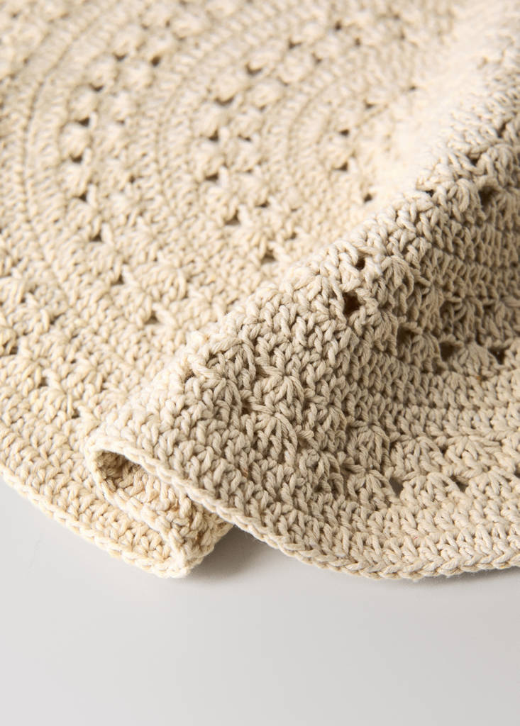 Round cotton table mat — Ecru