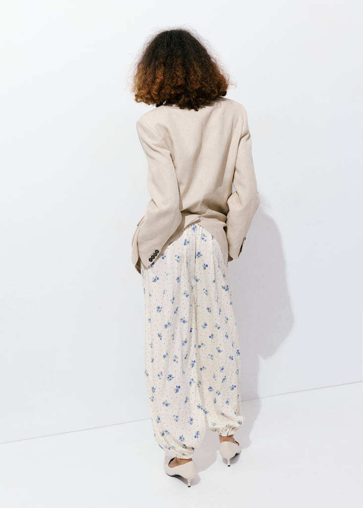Floral print baggy trousers — White