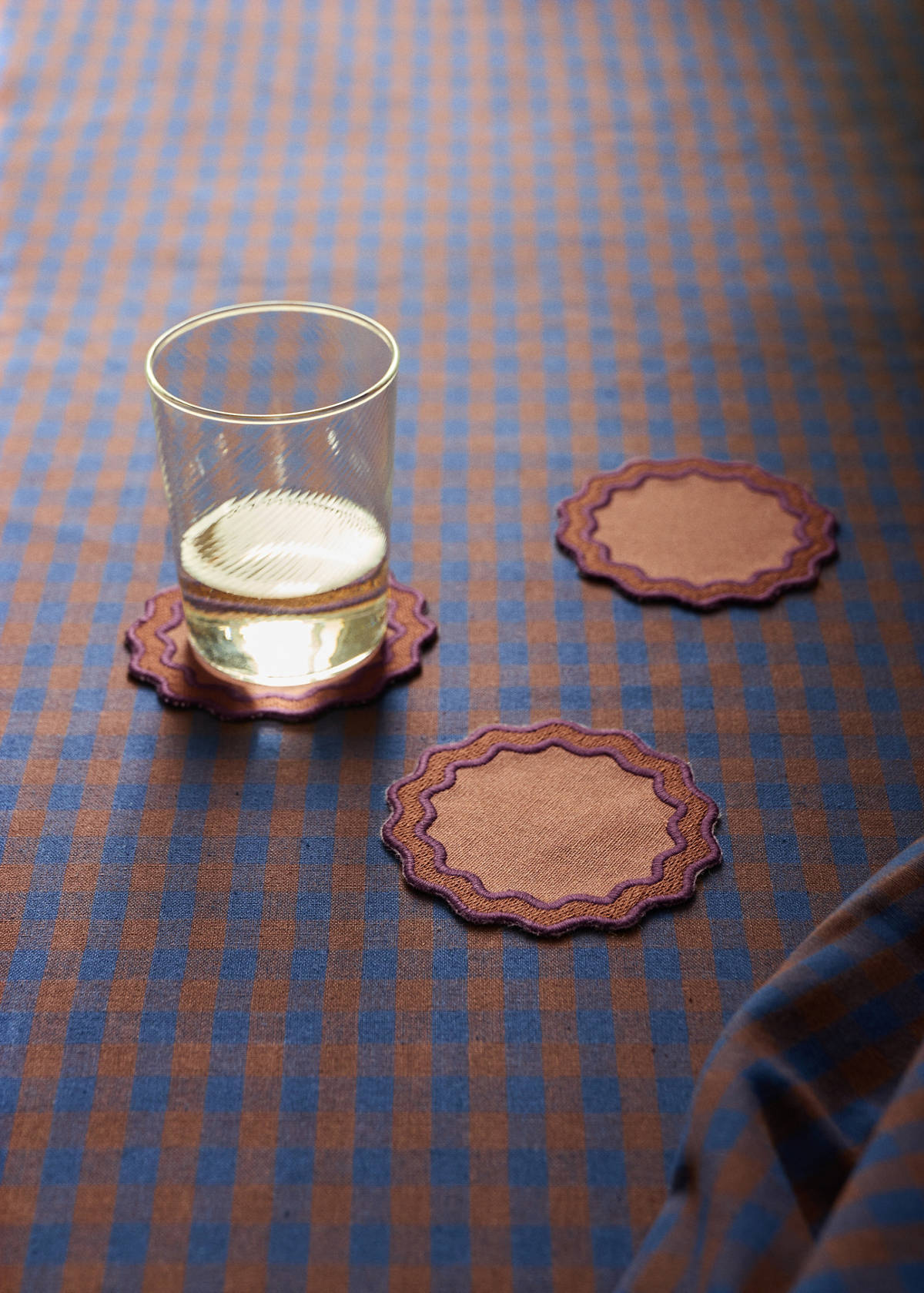Two-tone waved coated cotton coasters — Burnt Orange