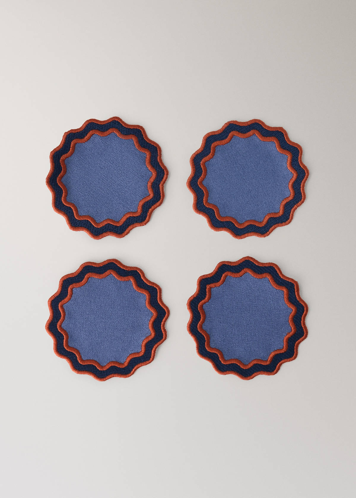 Two-tone waved coated cotton coasters — Indigo Blue