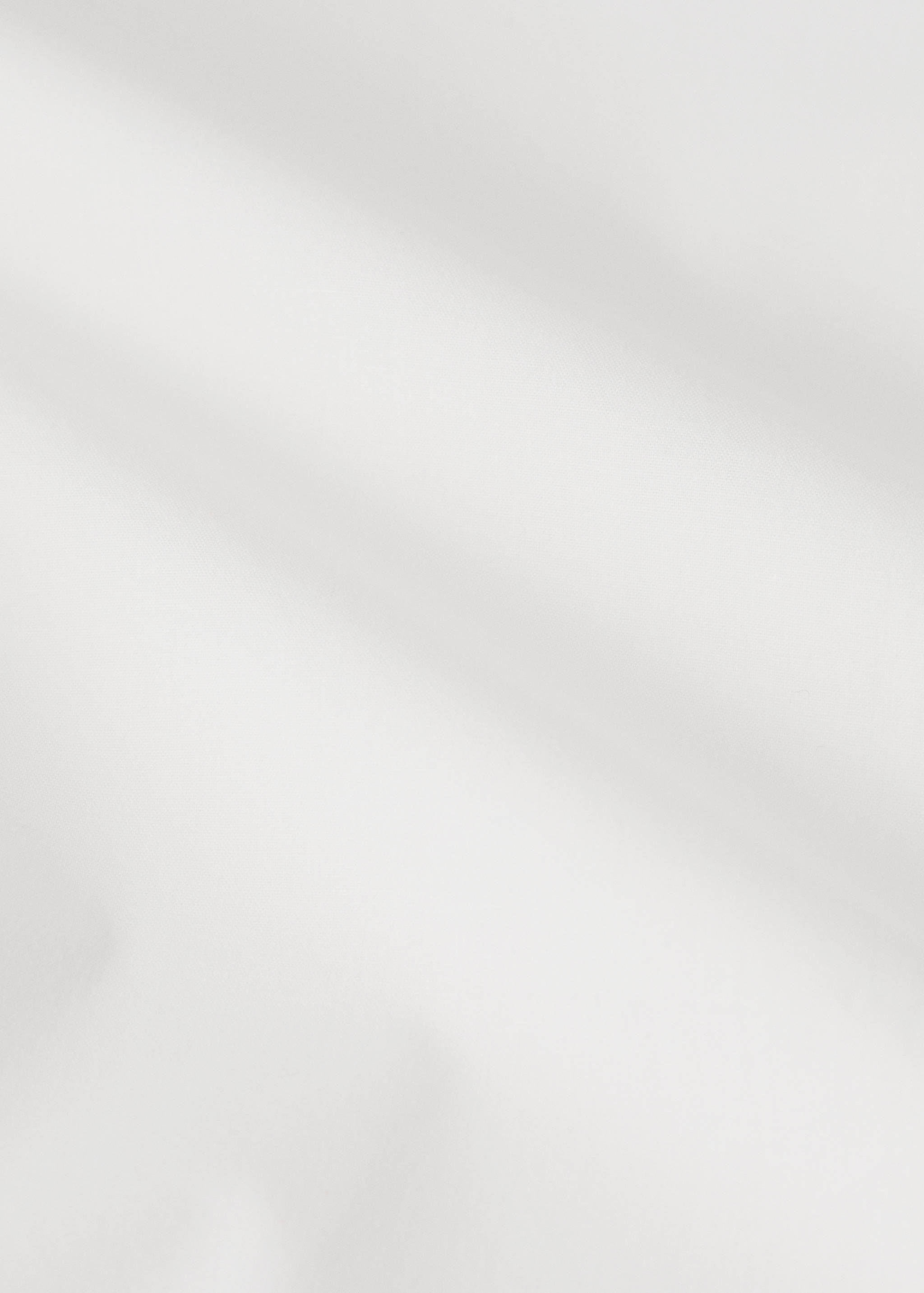 Close-up of a soft white baby sheet.