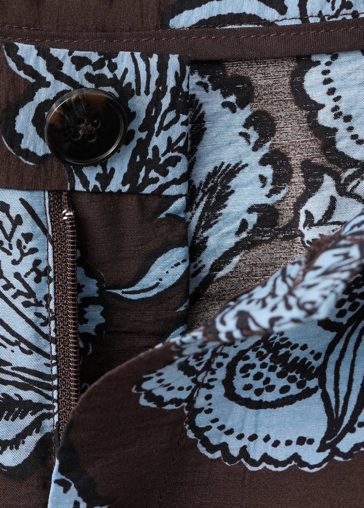 Pleated floral print shorts — Brown