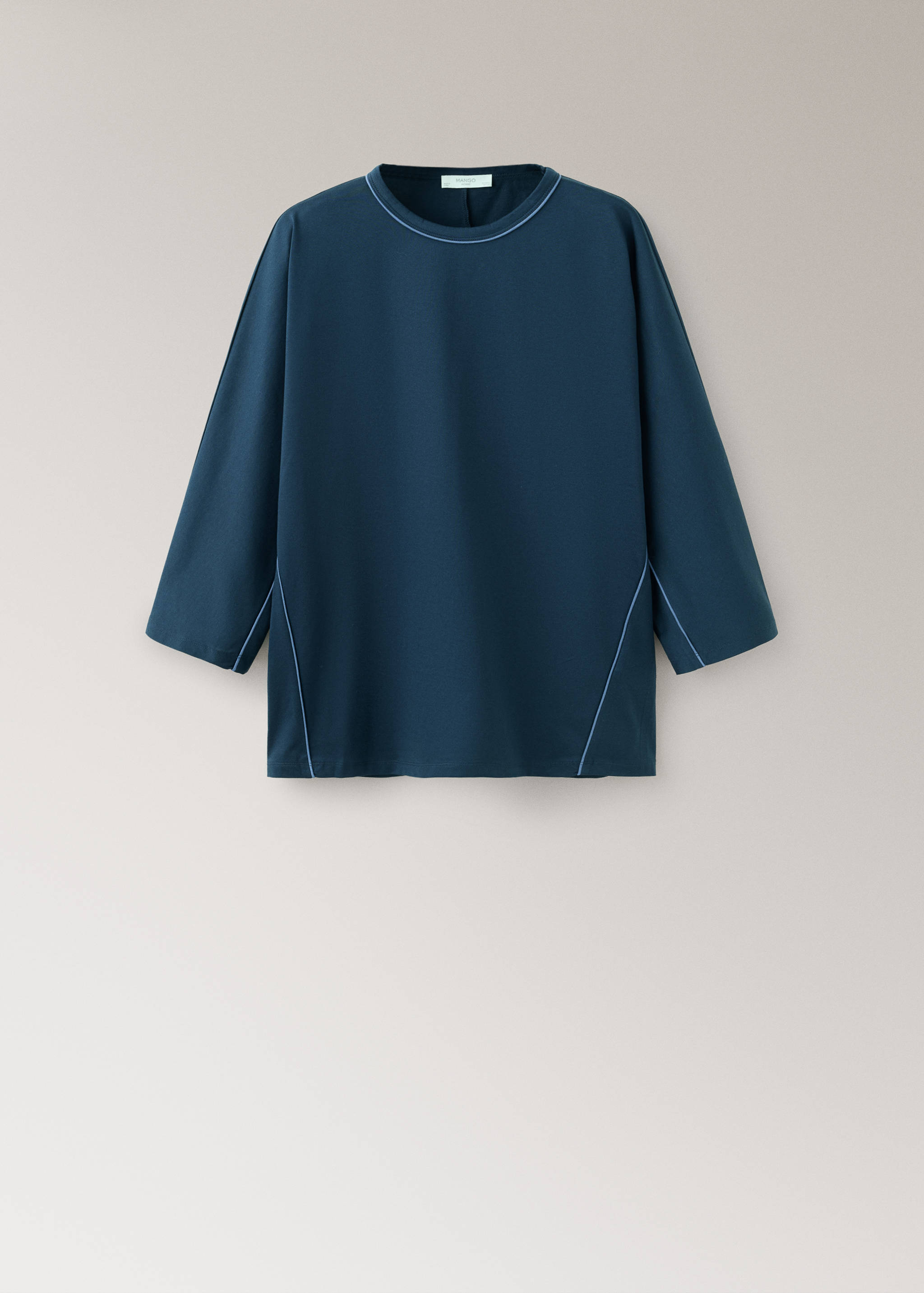 Top de pijama en verde azulado oscuro con manga tres cuartos y ribetes en azul claro.