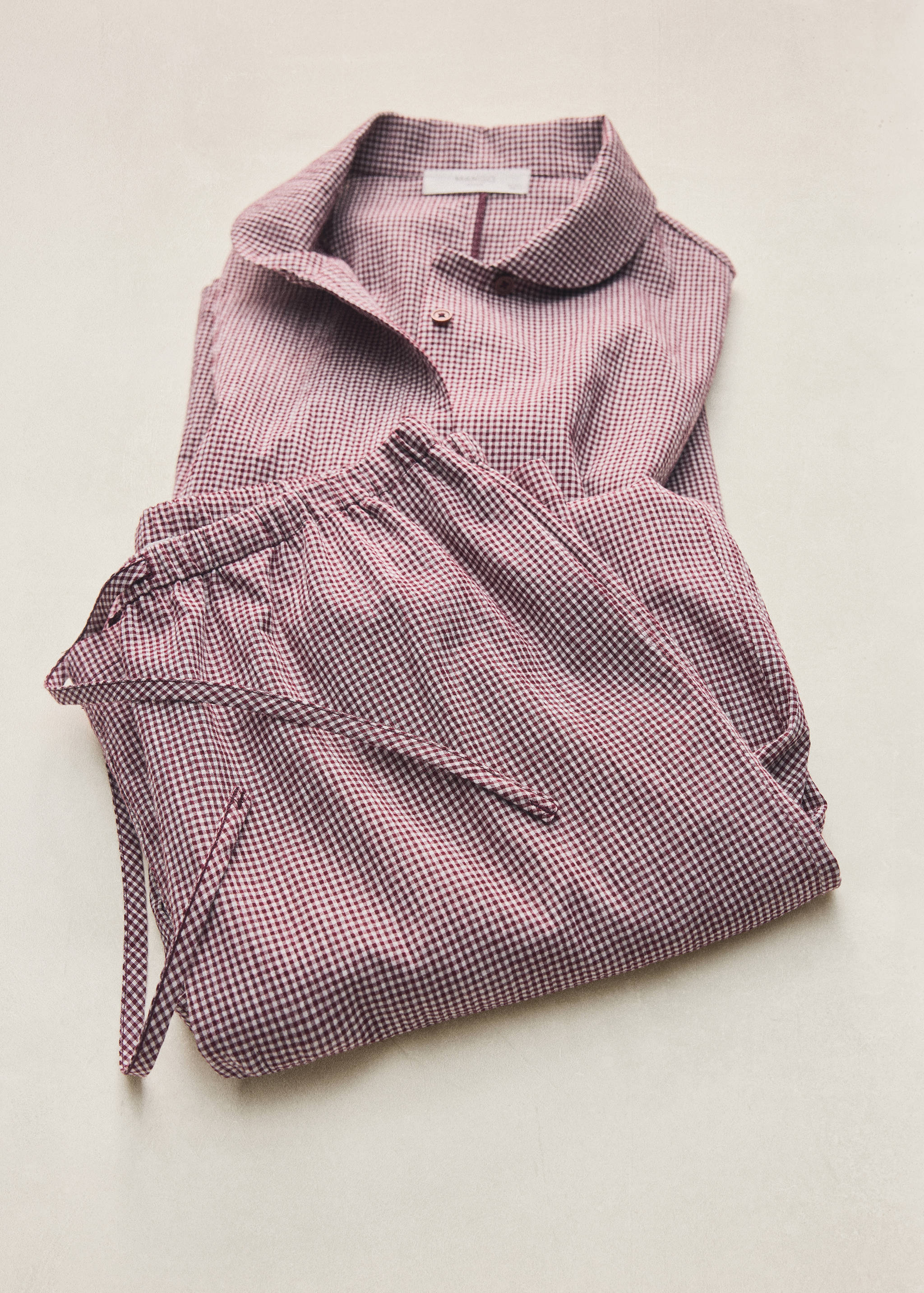 Burgundy and white micro-gingham check pyjama set with a rounded collar.