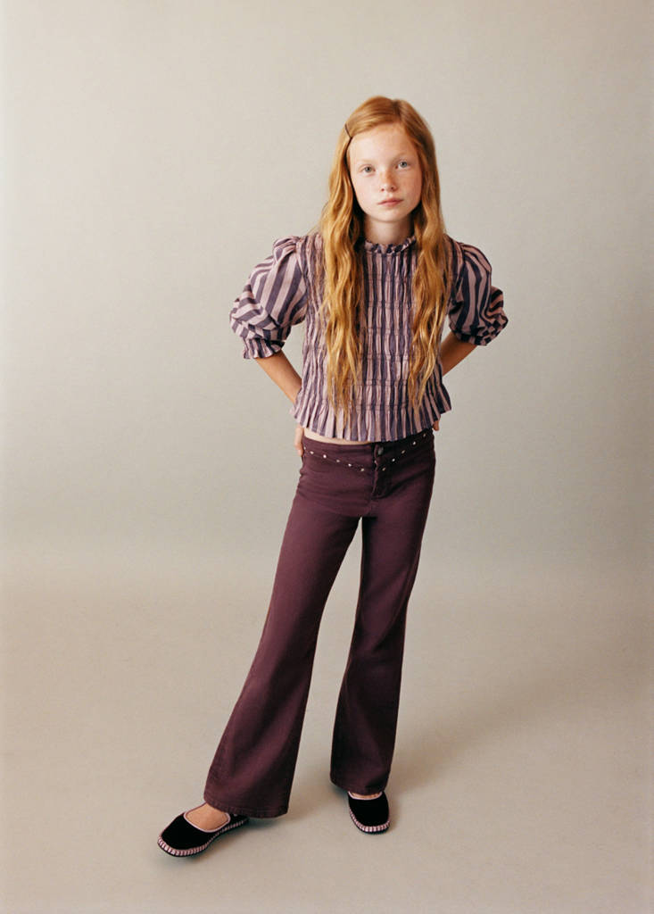 Flared jeans with studs — Plum