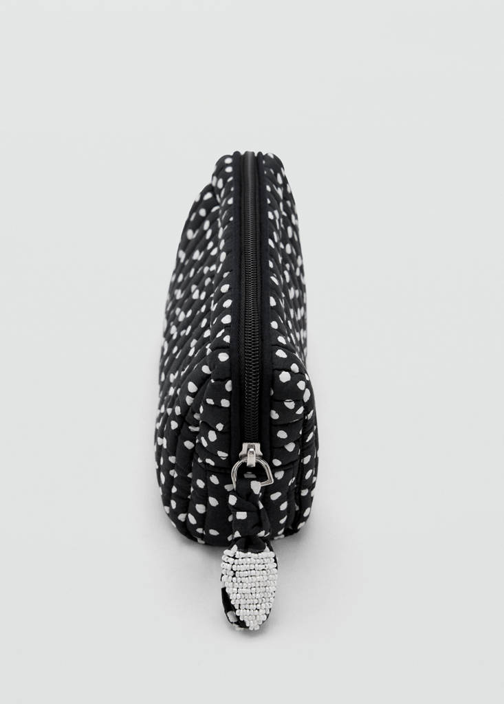 Padded wash bag with spots — Black