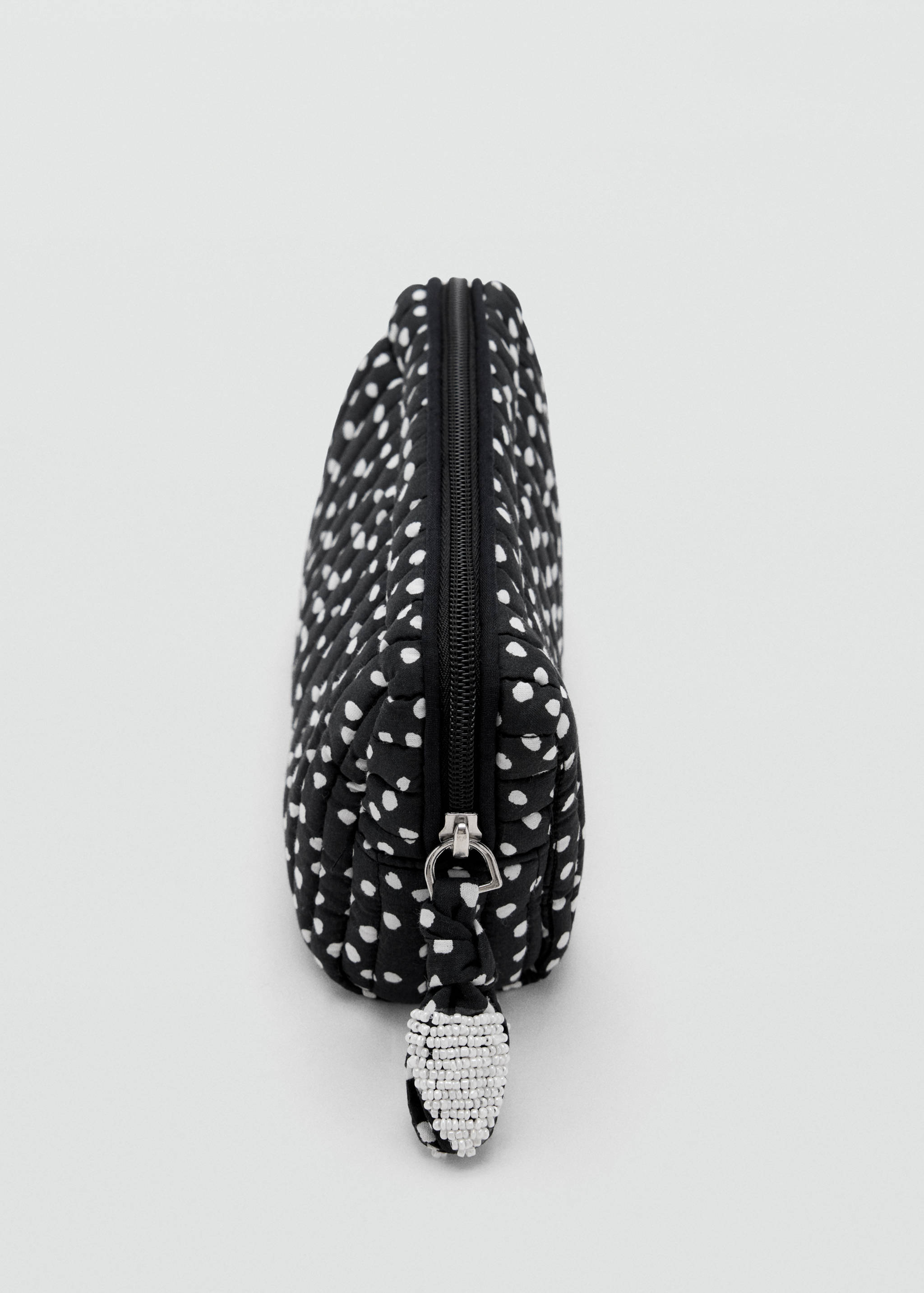 Padded wash bag with spots - Details of the article 1