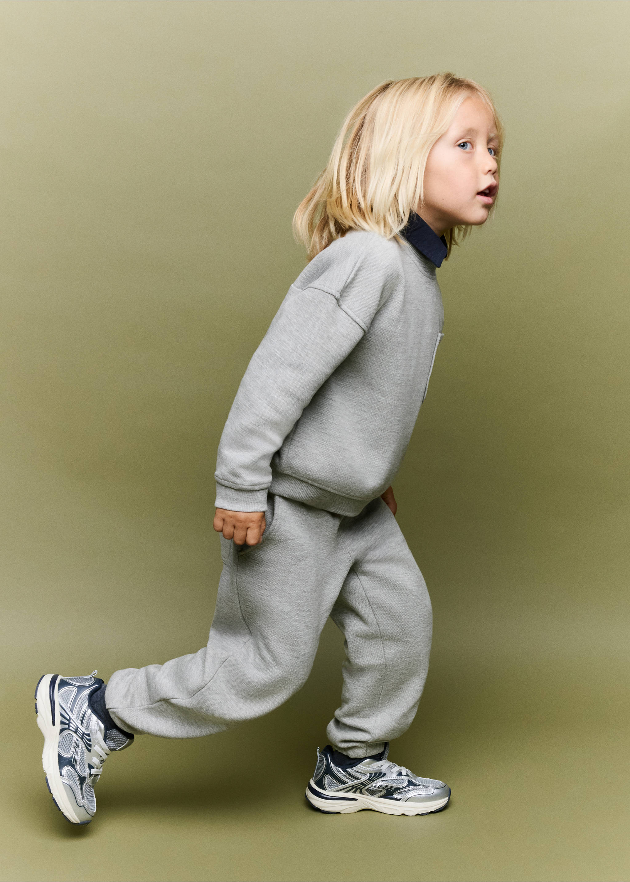 Grey joggers for kids with elasticated cuffs, worn as a matching set., Light Heather Grey. Ref: 37094779-00.