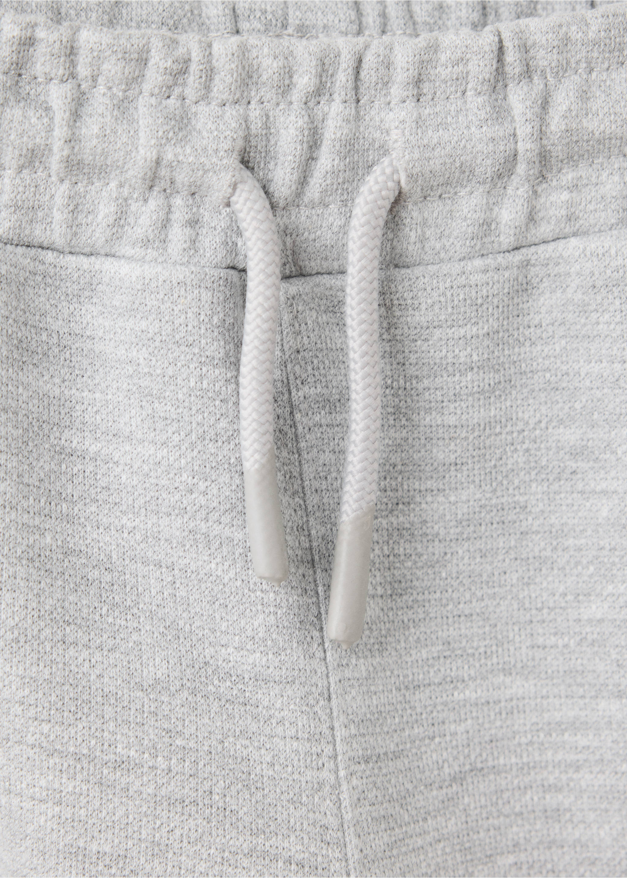 Cotton jogger-style trousers - Details of the article 8, Light Heather Grey. Ref: 37094779-00.
