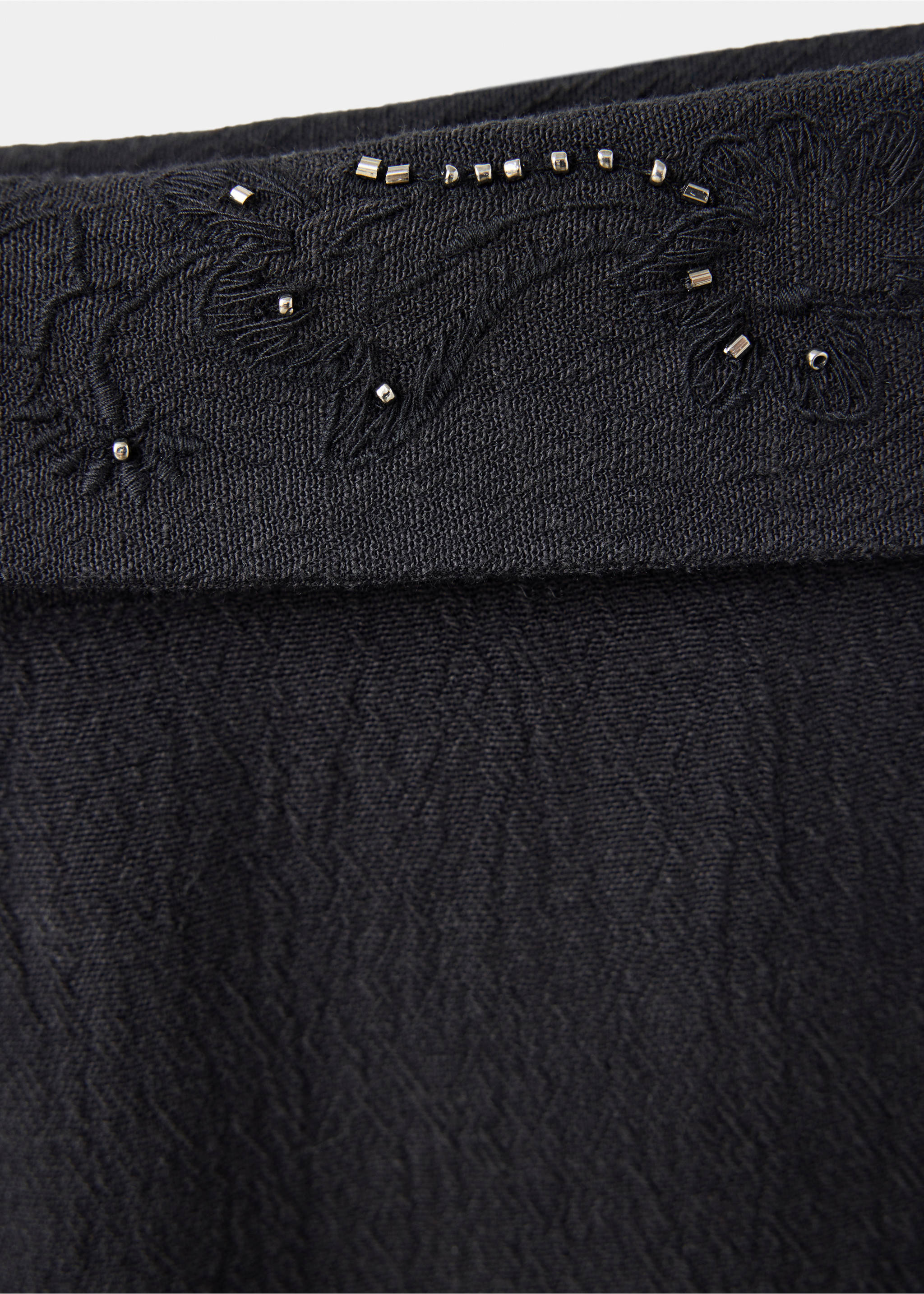 Trousers with embroidered turn-up waistline - Details of the article 8, Charcoal. Ref: 37094787-00.