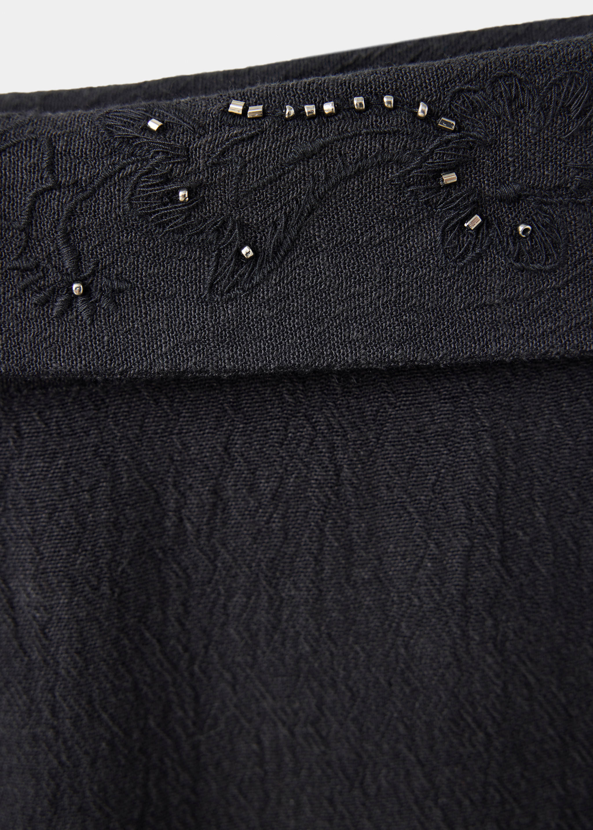 Trousers with embroidered turn-up waistline - Details of the article 8