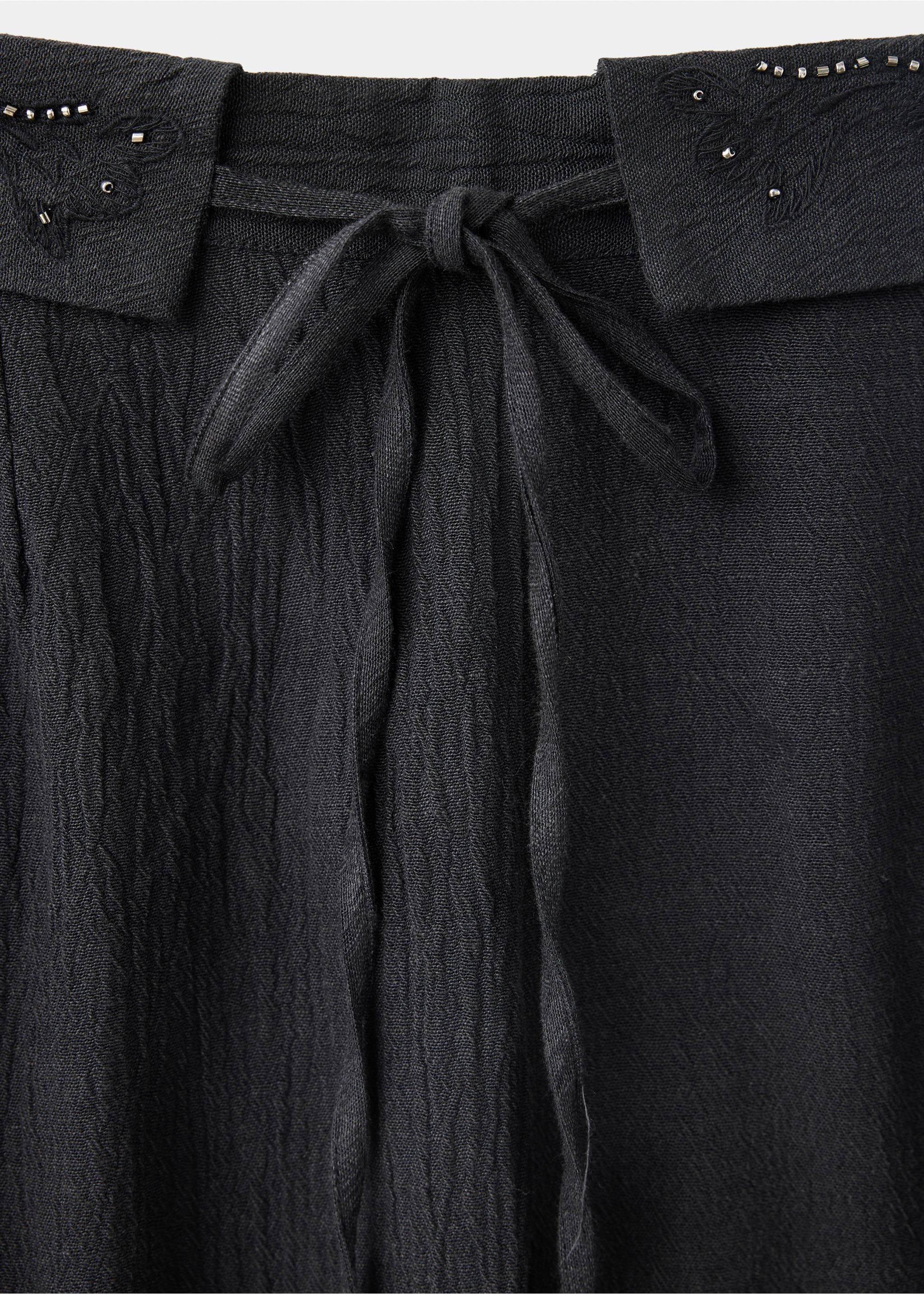 Trousers with embroidered turn-up waistline - Details of the article 0, Charcoal. Ref: 37094787-00.