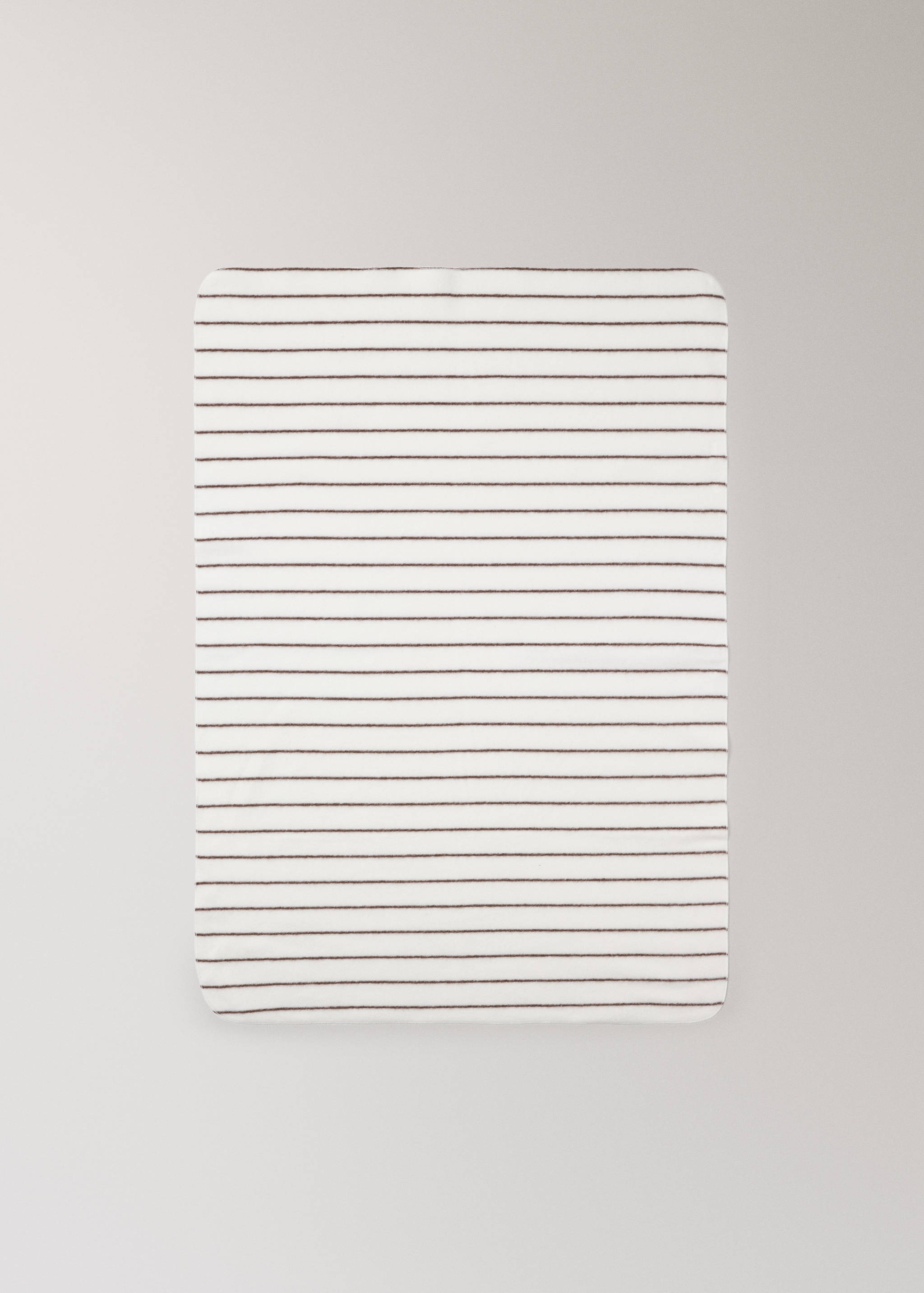 White blanket with thin horizontal brown stripes.