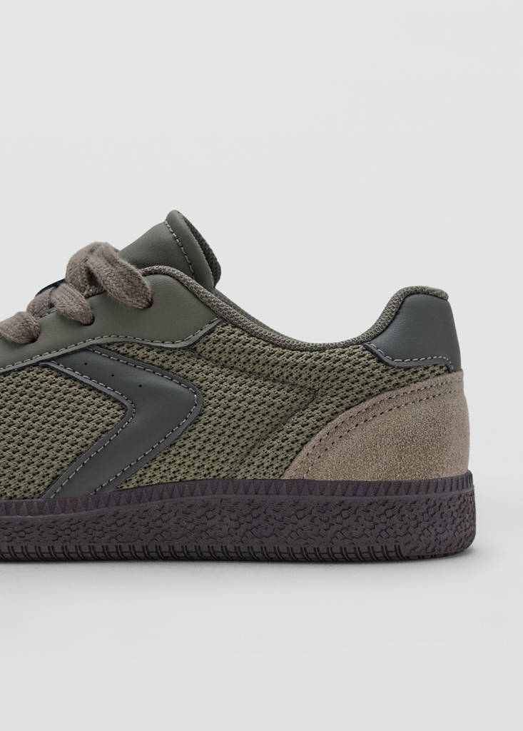 Combined trainers with leather detail