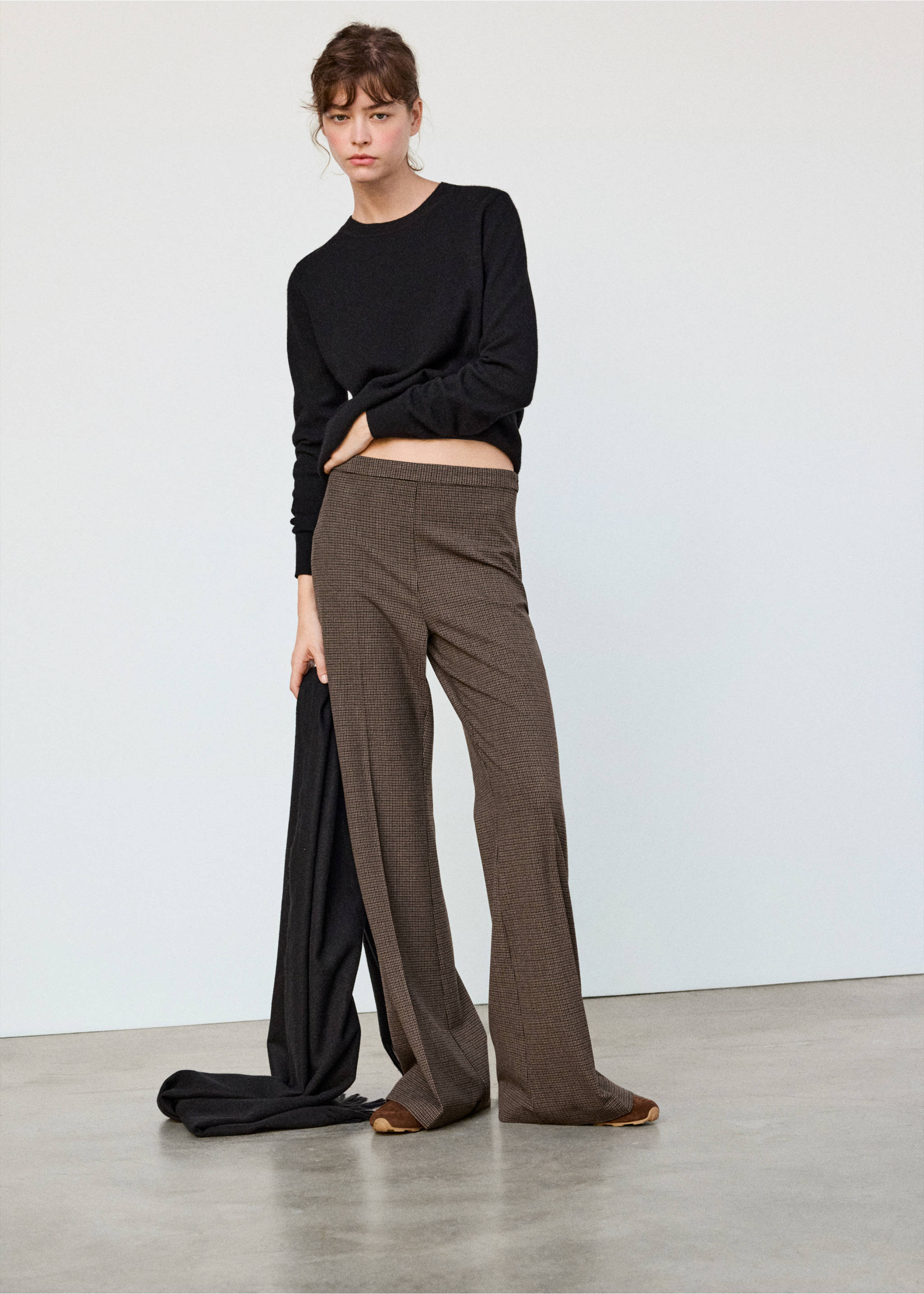 Brown houndstooth trousers with a straight-leg fit, styled with a black sweater., Chocolate. Ref: 37095864-02.