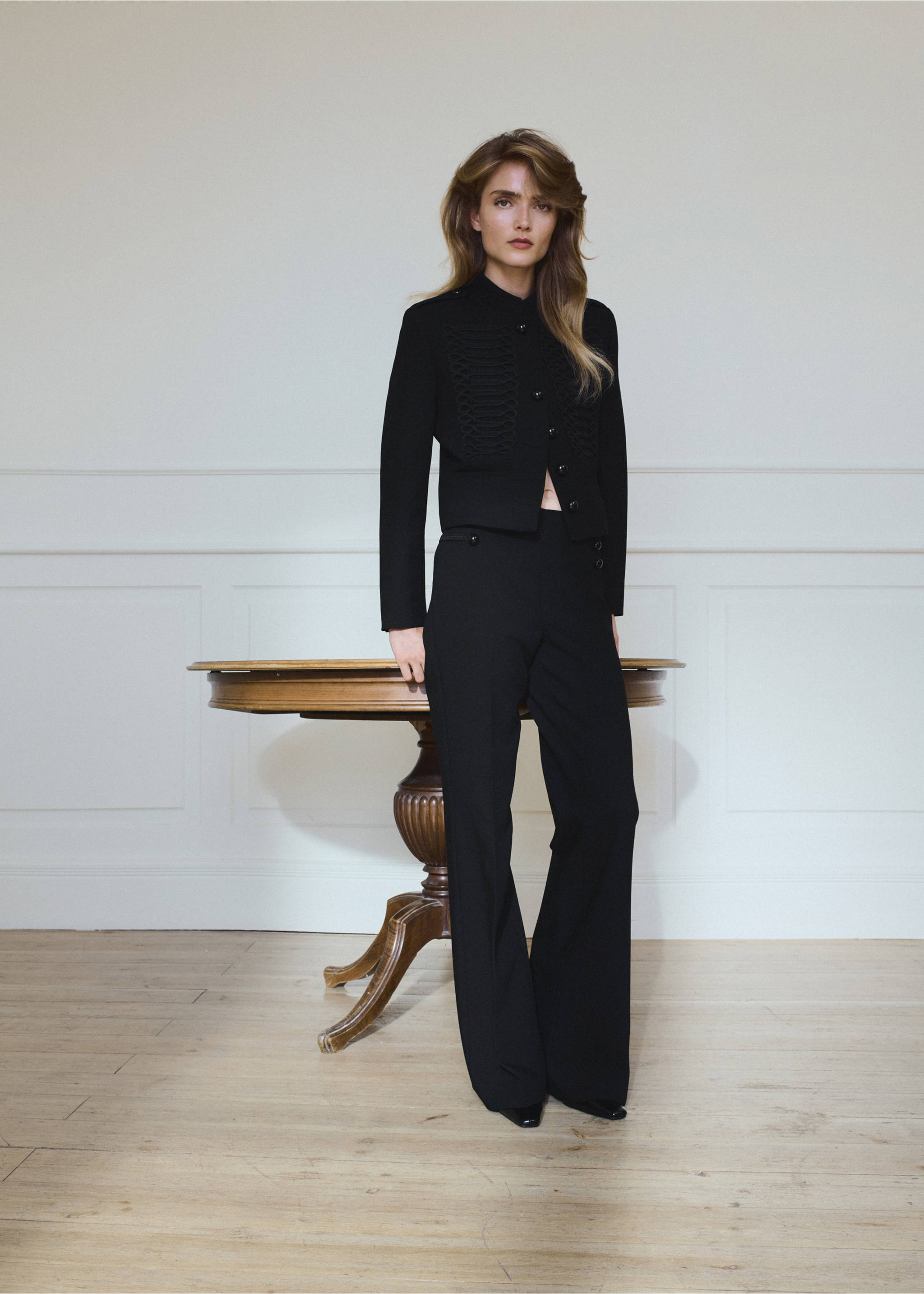 Black trousers worn with a matching braided cropped jacket., Black. Ref: 37095869-01.