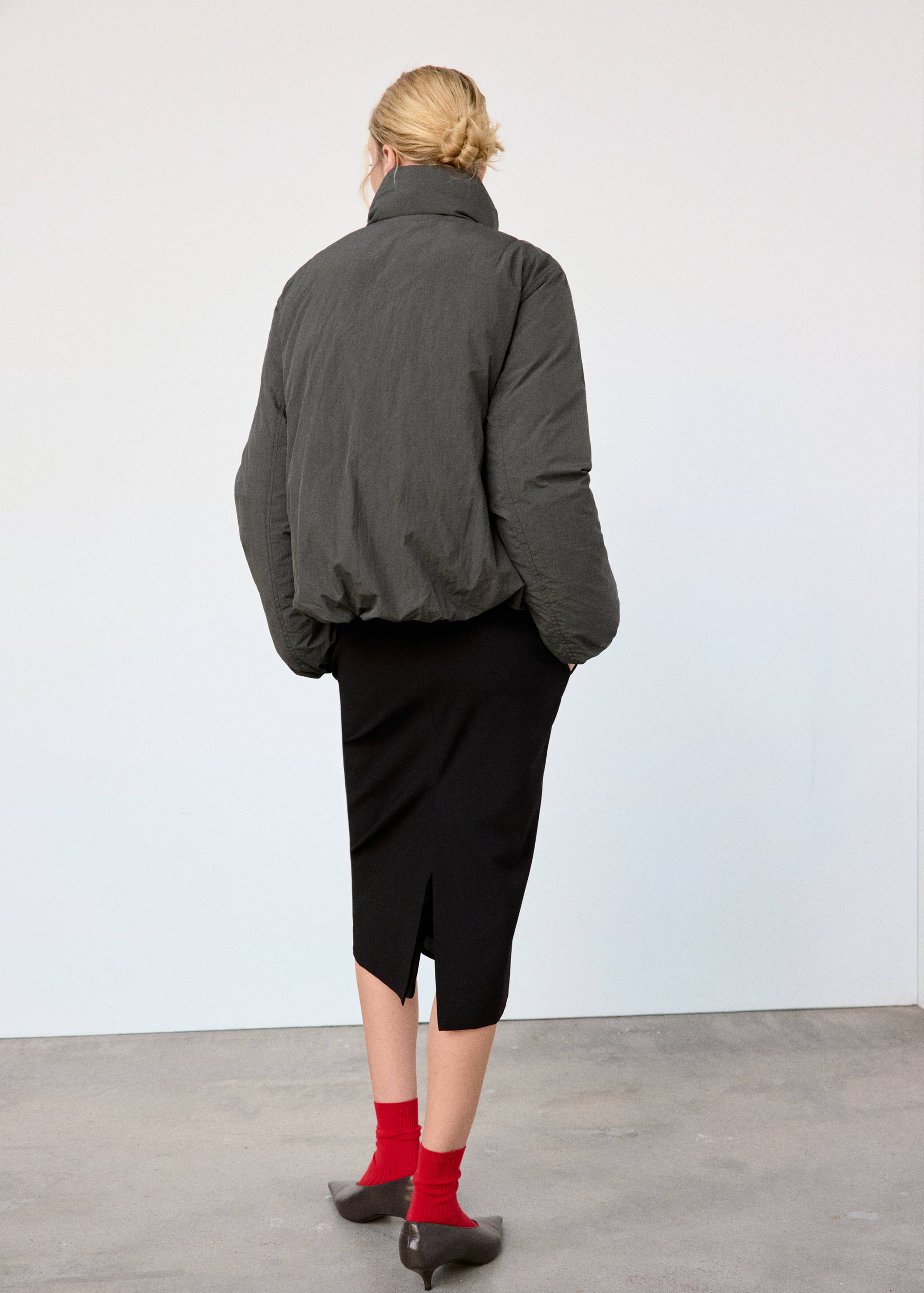 Dark grey padded anorak, back view