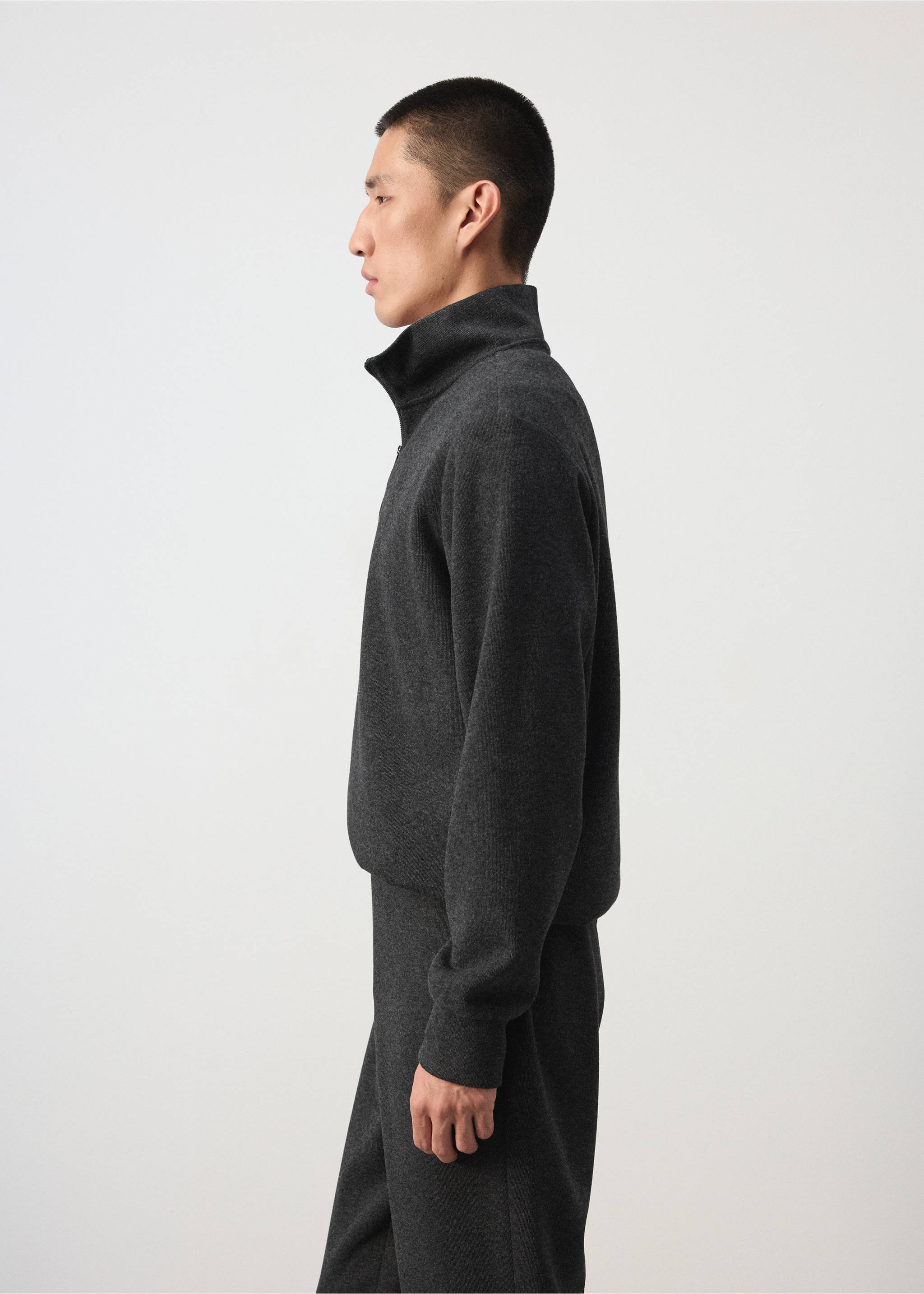 Dark grey high-neck sweatshirt with half-zip, shown in profile., Dark Grey. Ref: 37095995-00.
