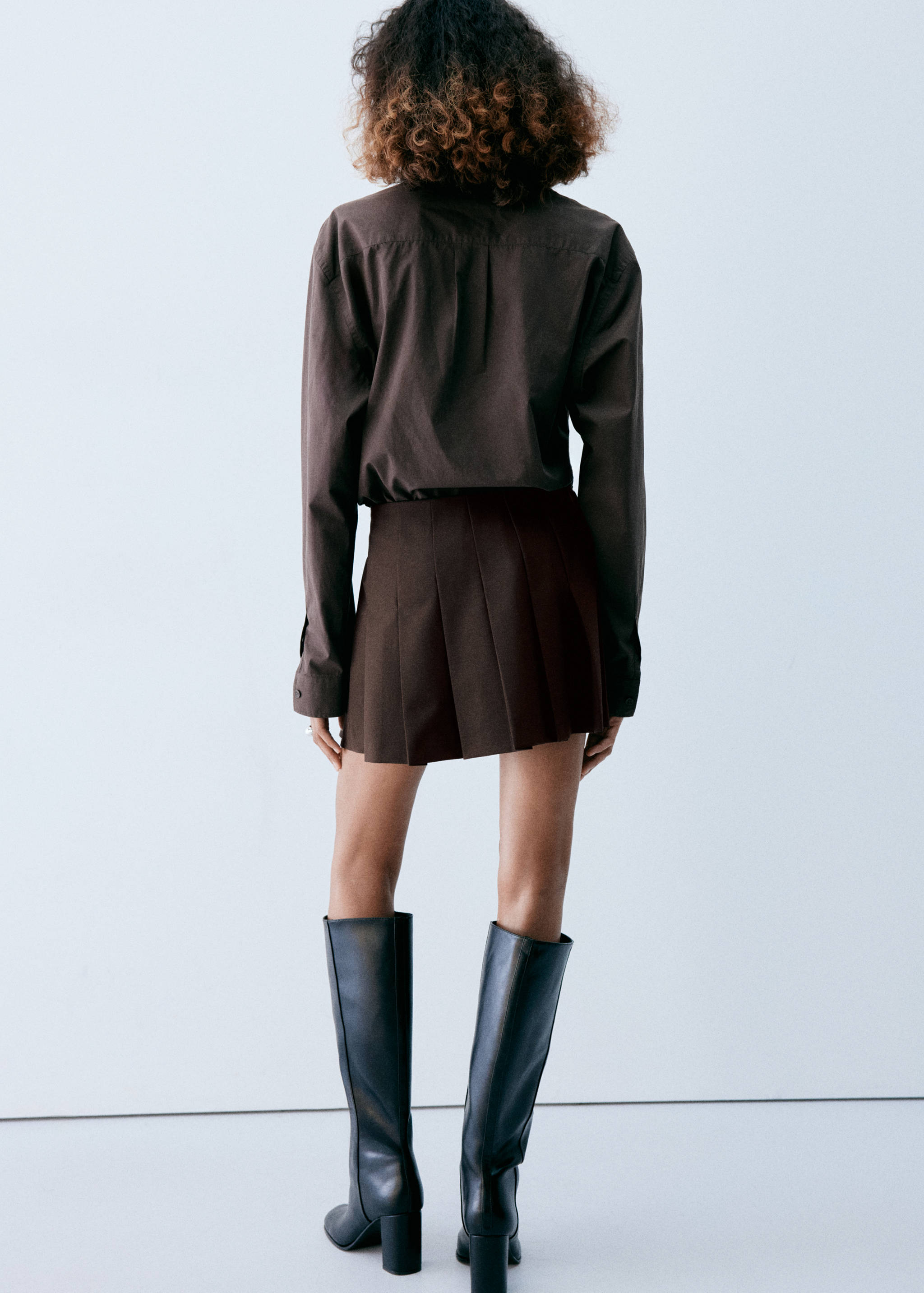 Pleated skirt with buckle details - Reverse of the article