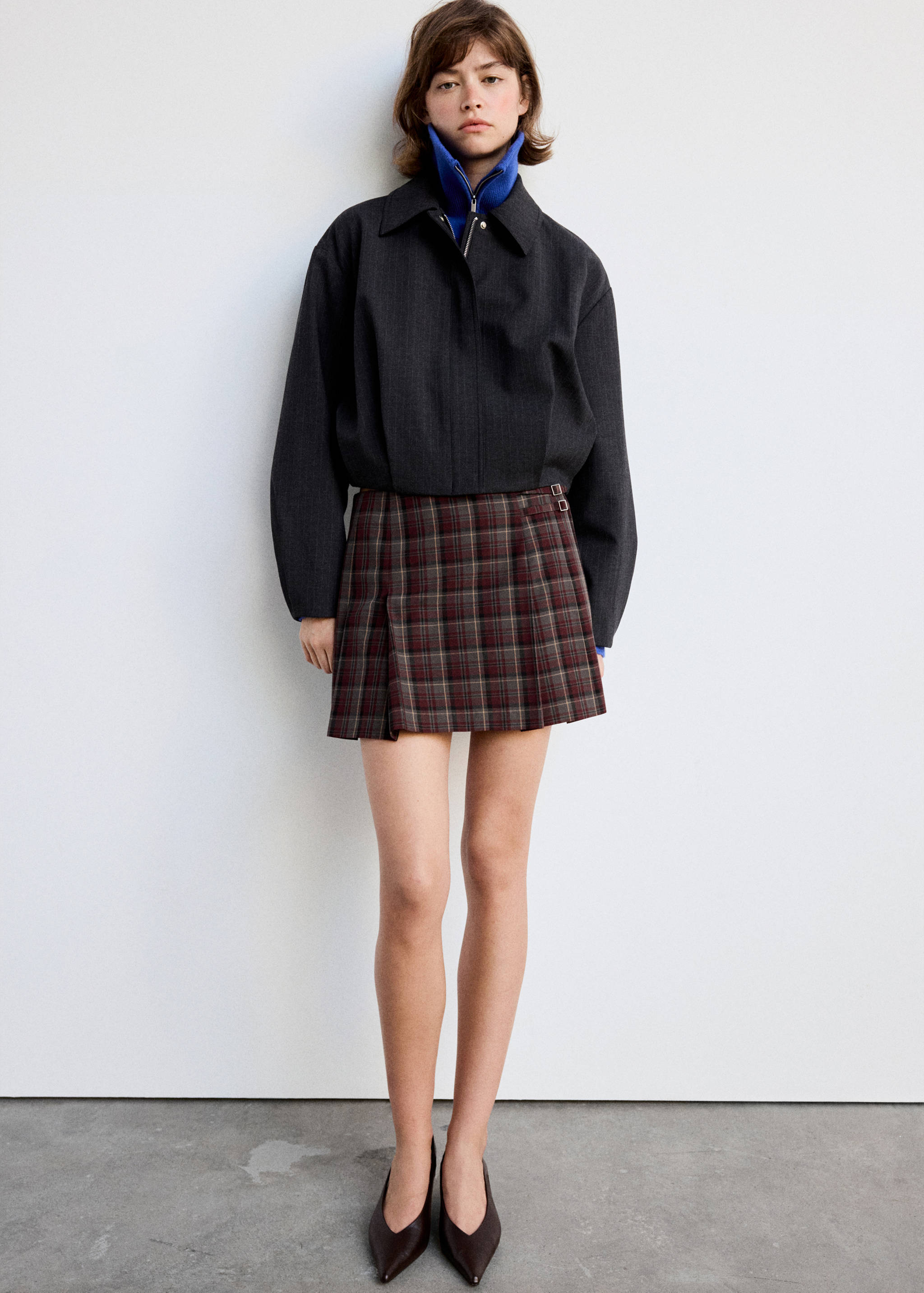 Pleated skirt with buckle details - General plane