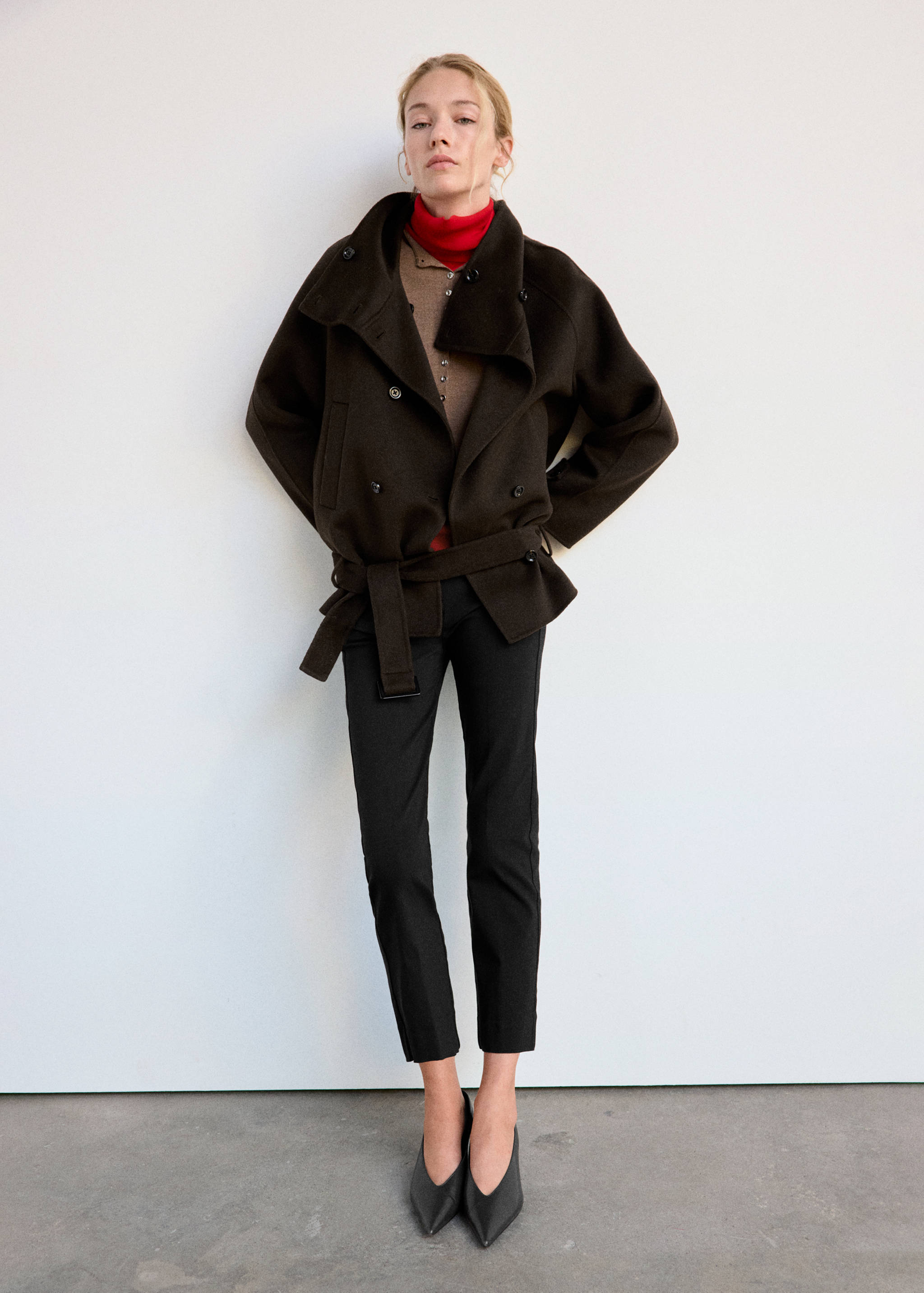 Dark brown wrap jacket with oversized collar and matching belt.