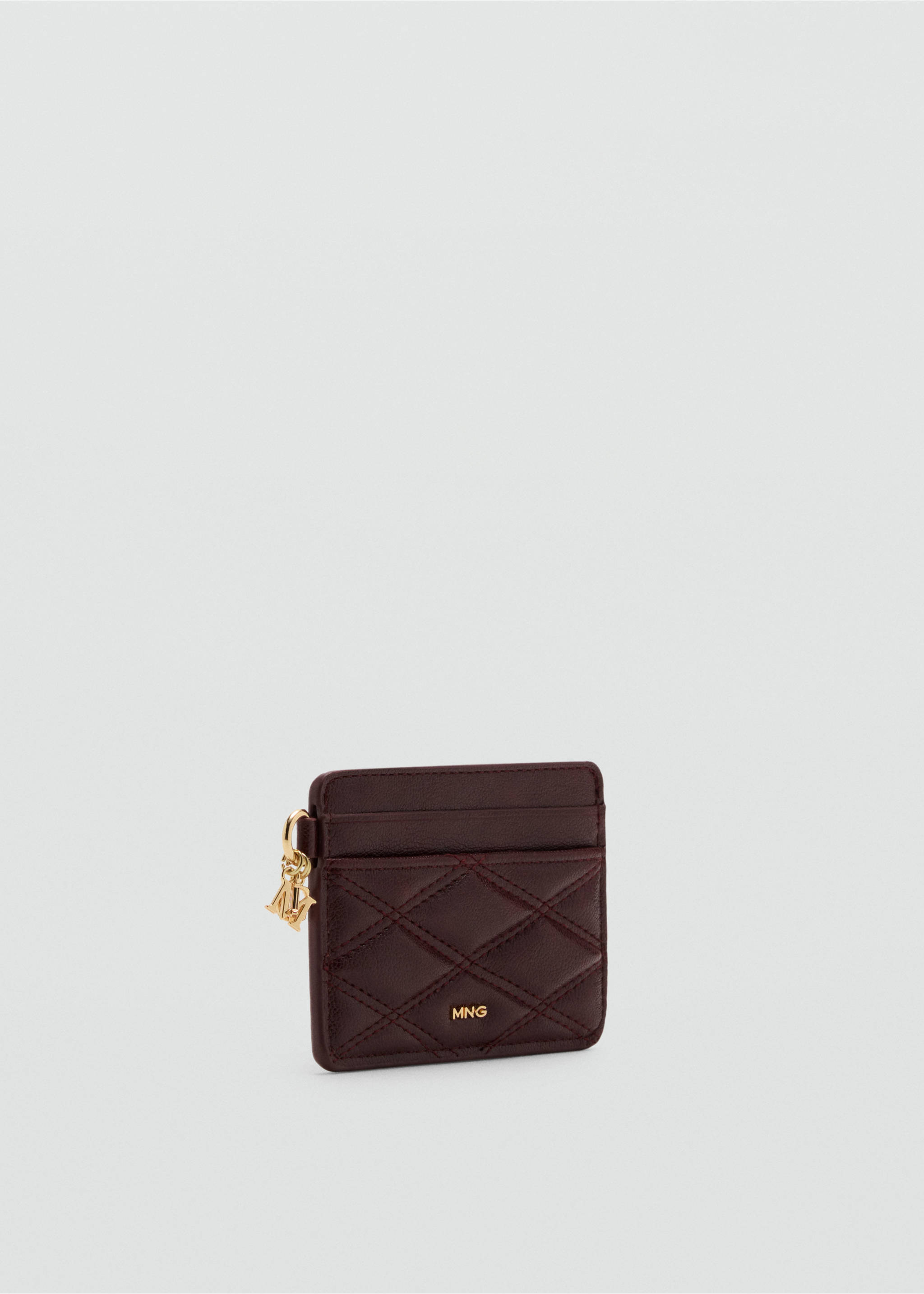 Burgundy quilted card holder with a gold logo and side charm., Cherry. Ref: 37096364-00.
