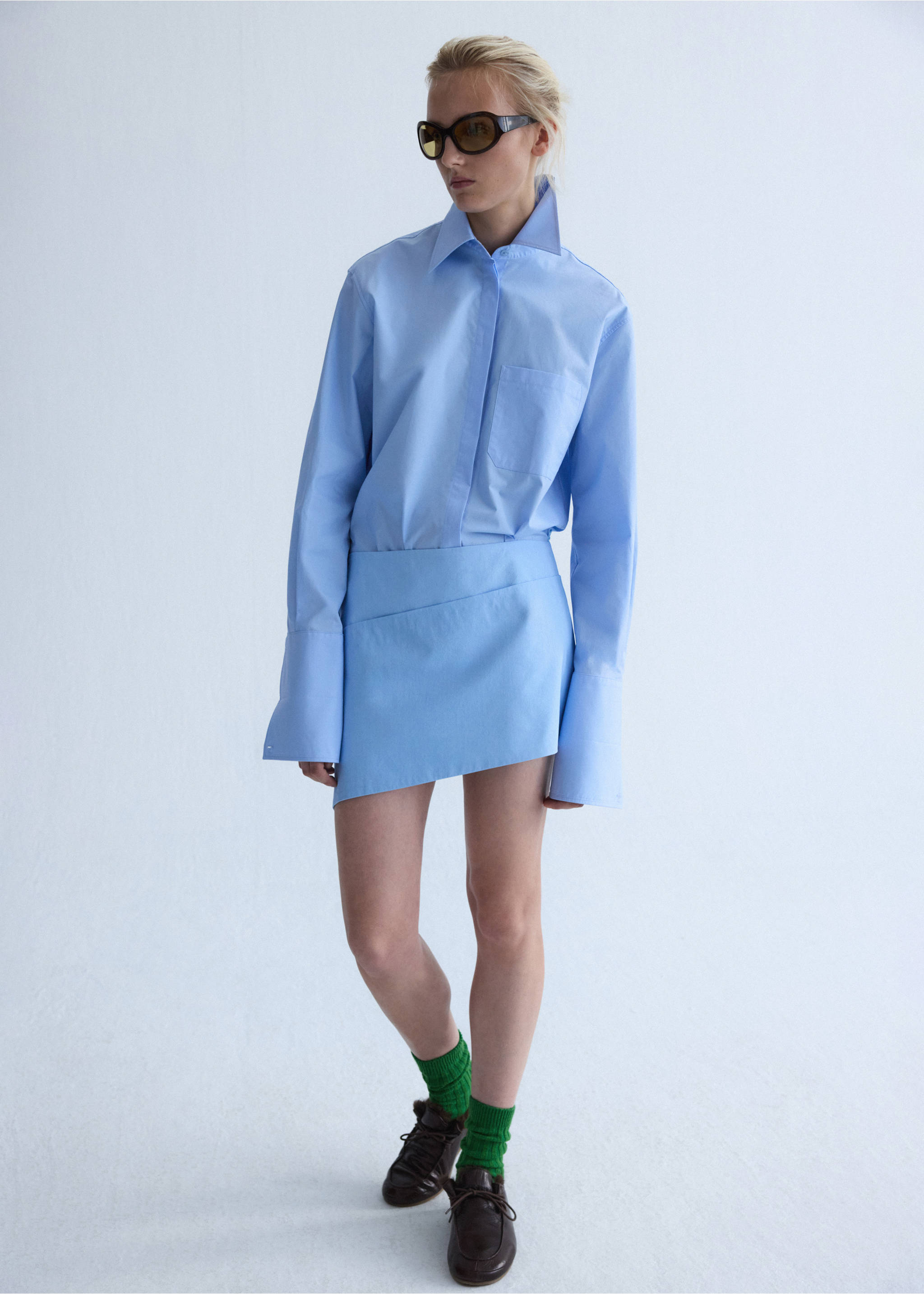 Poplin skirt with an asymmetric hem - Details of the article 1, Sky Blue. Ref: 37096366-00.