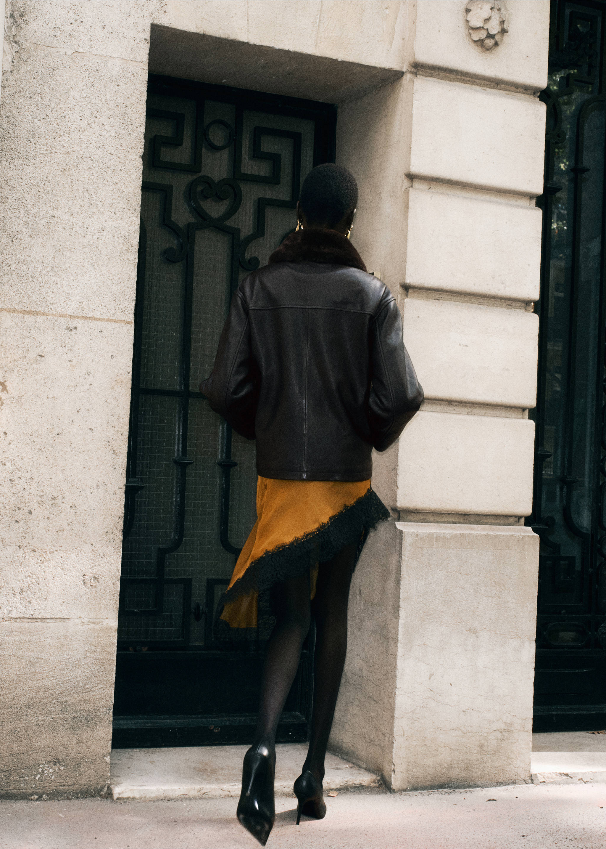 Dark brown jacket with faux-fur collar, shown from the back., Brown. Ref: 37096722-00.