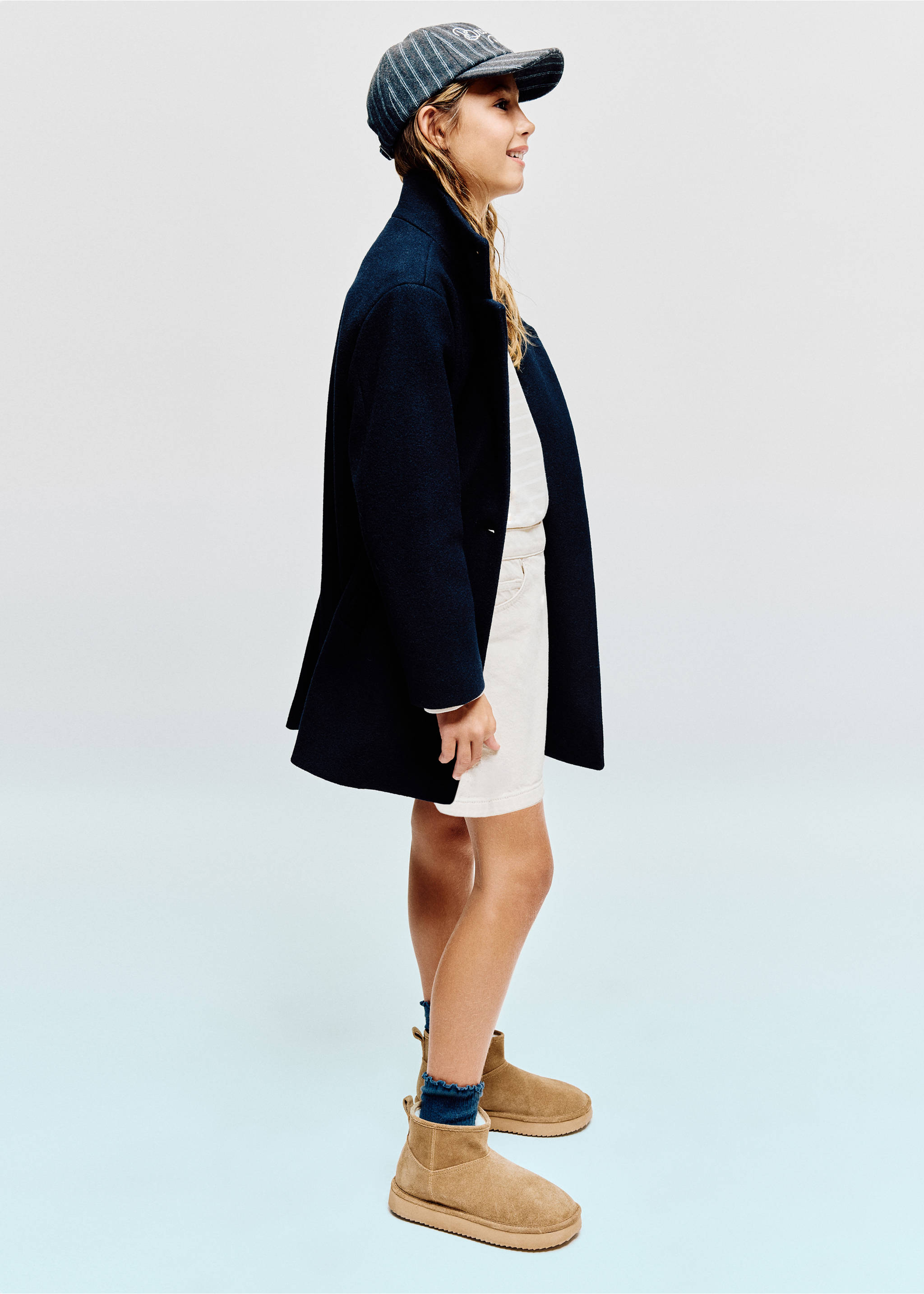Navy blue coat worn with an outfit and tan ankle boots., Navy. Ref: 37096724-00.