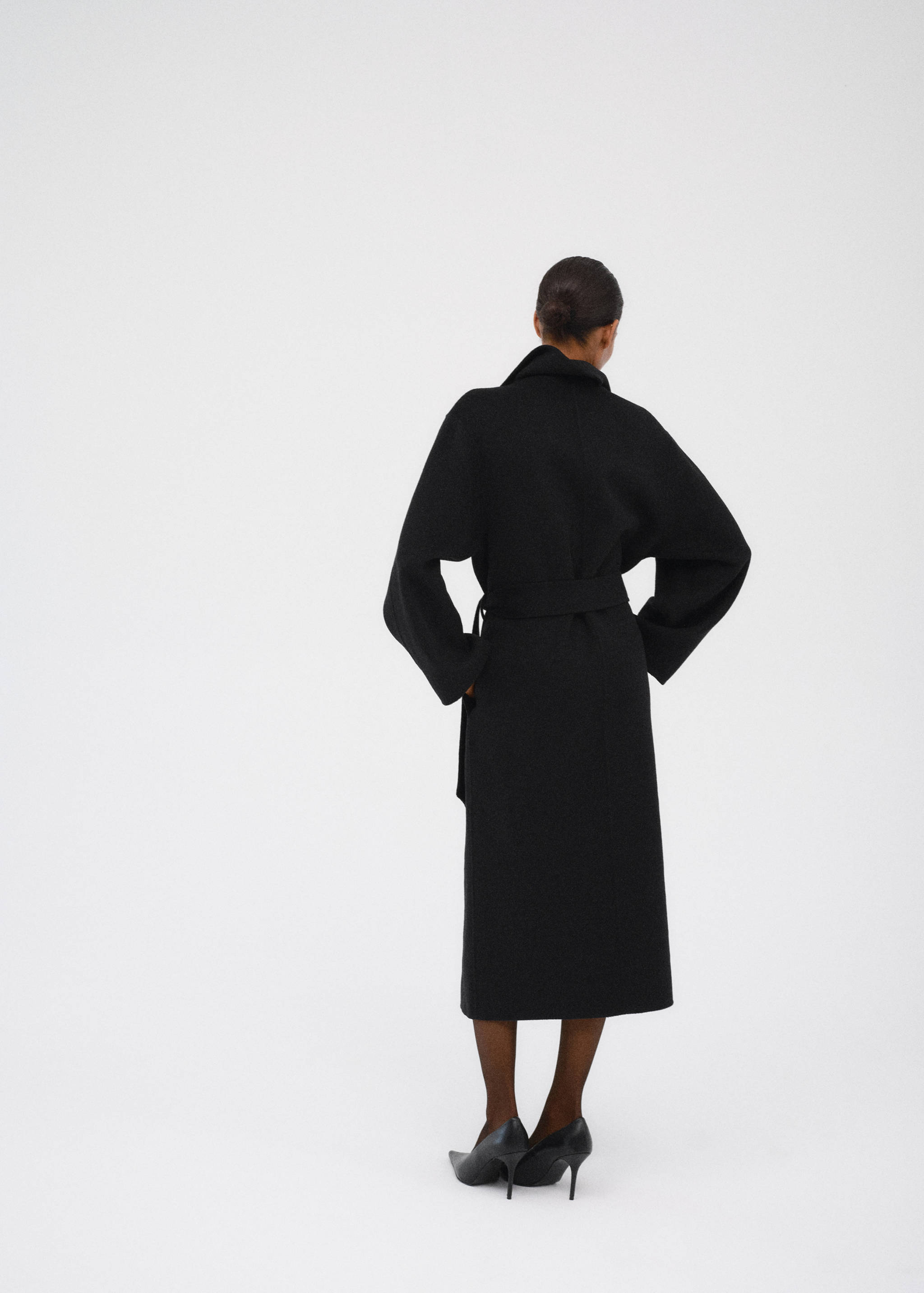 Manteau laine fait à la main ceinture - Verso de l’article