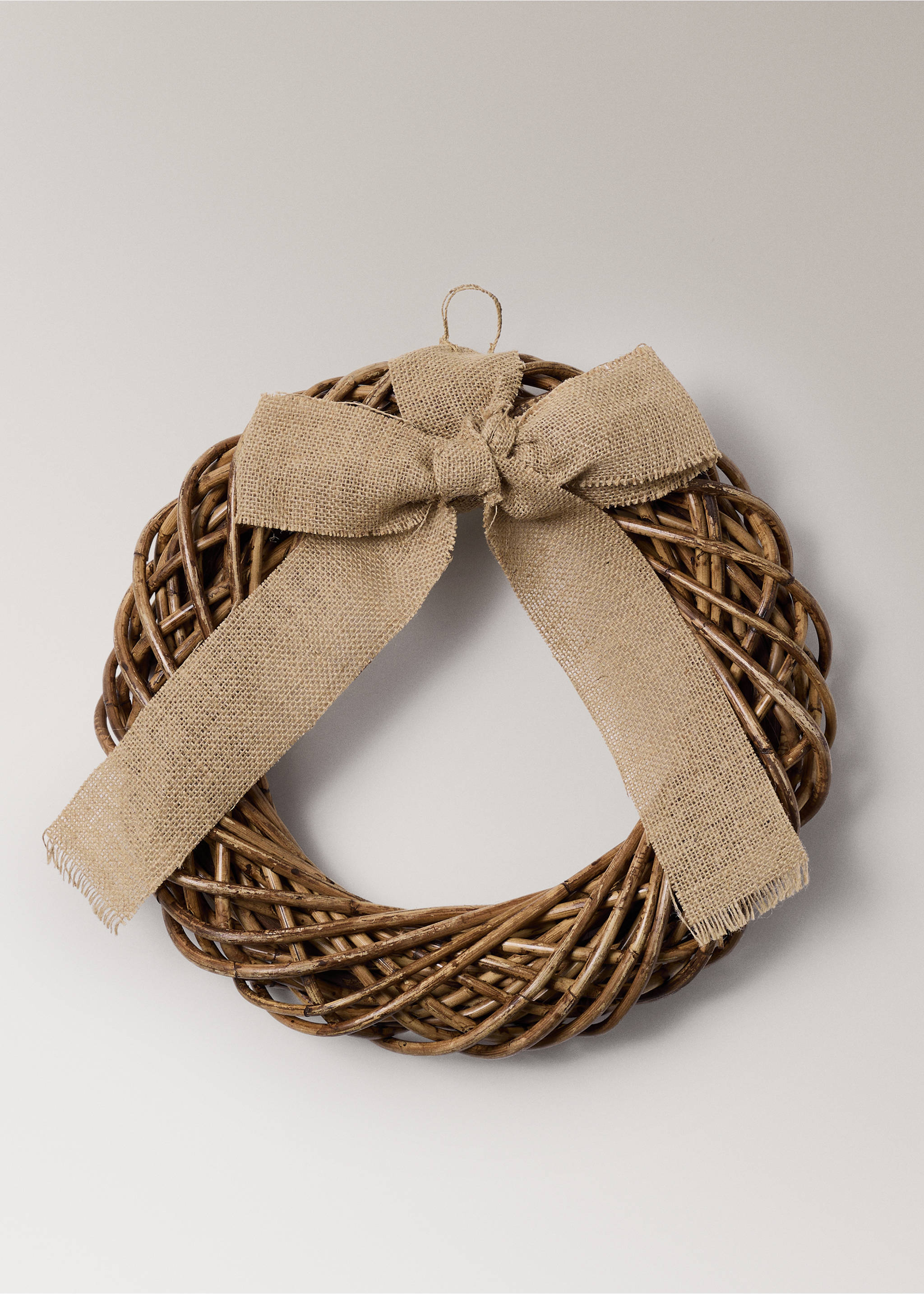 Brown woven wicker wreath decorated with a large natural burlap bow., Brown. Ref: 37096729-00.