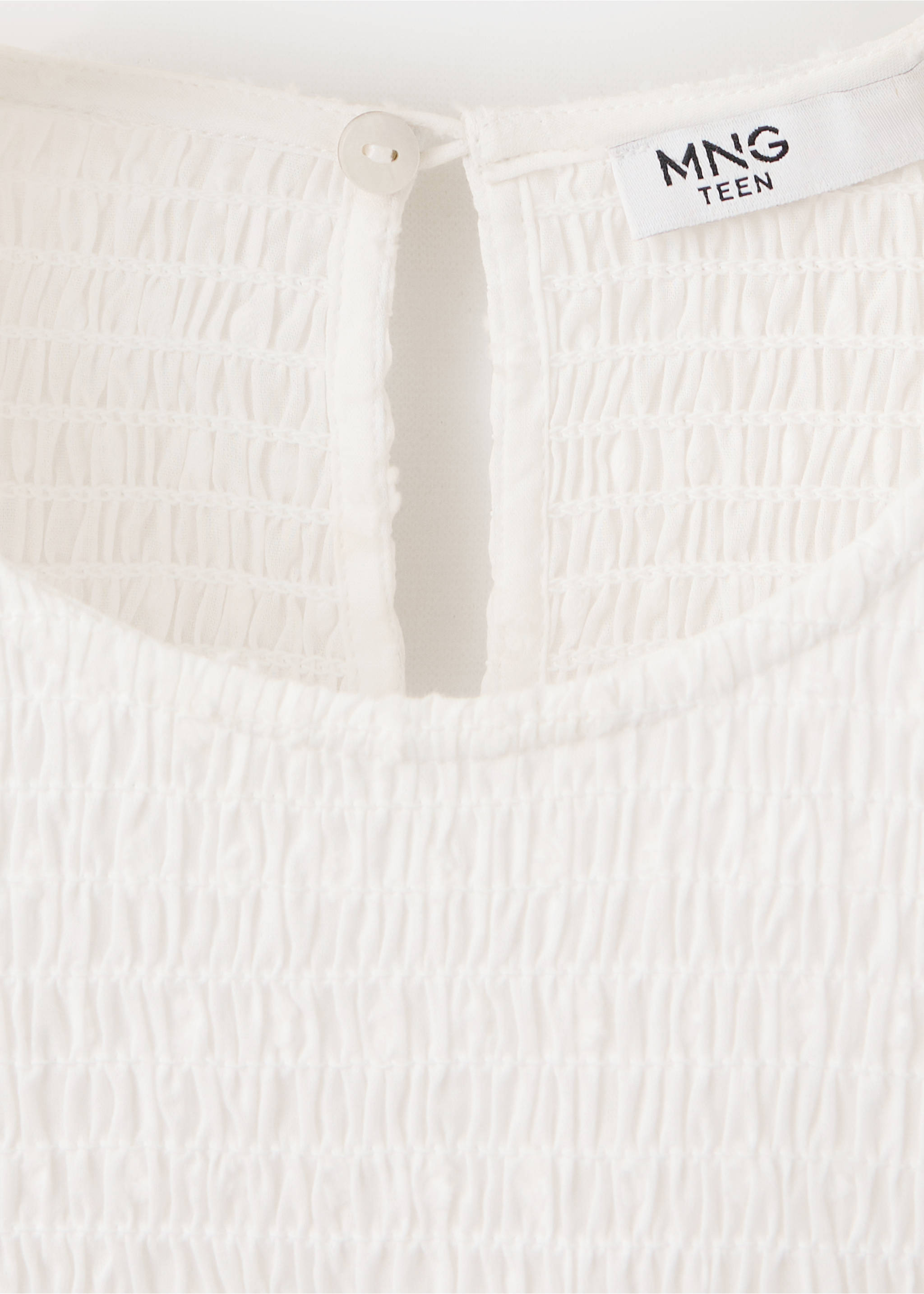 Cotton shirt with honeycomb texture and metallic ring detail - Details of the article 8, Off White. Ref: 37096736-00.